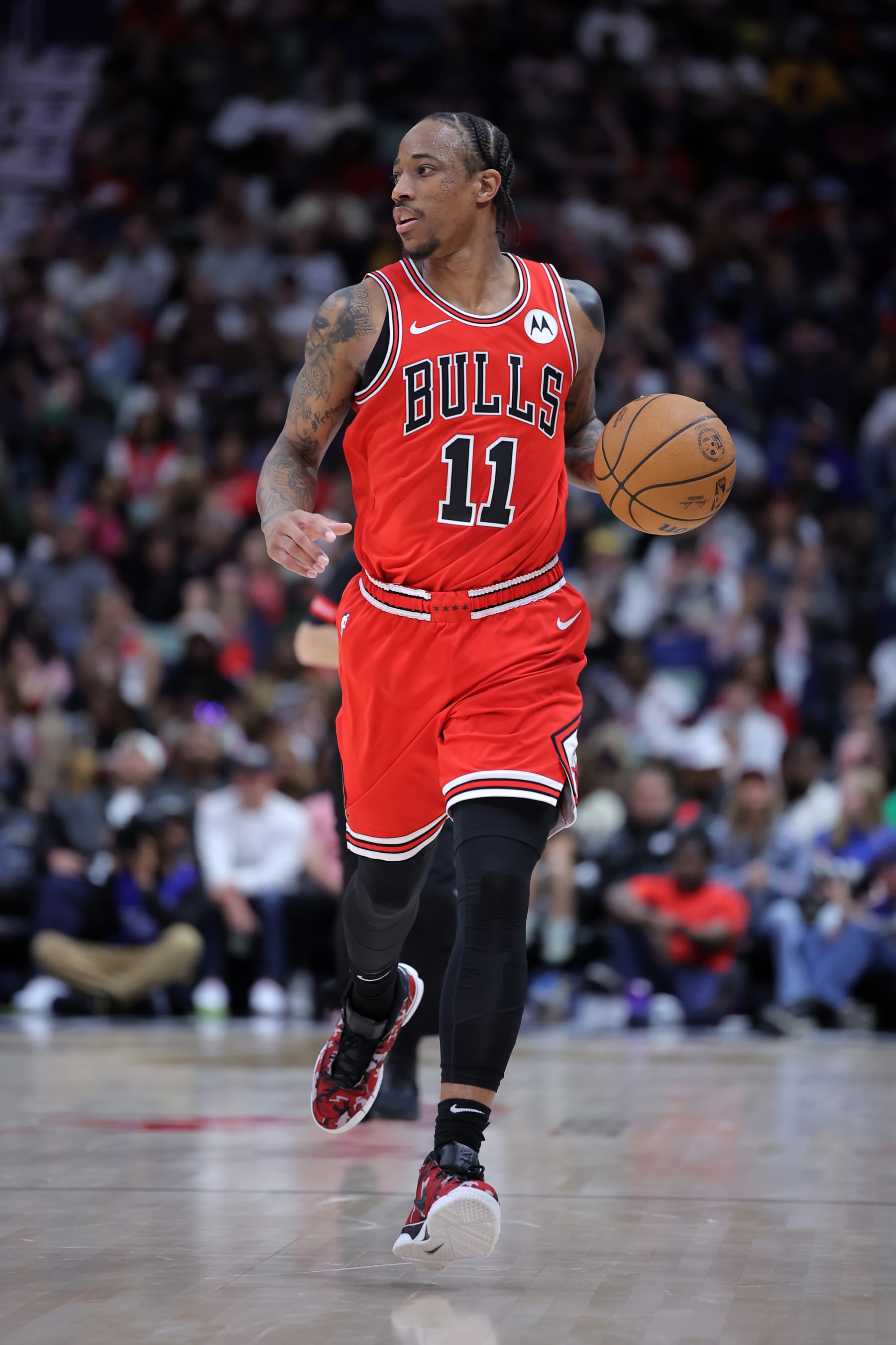 NEW ORLEANS, LOUISIANA - FEBRUARY 25: DeMar DeRozan #11 of the Chicago Bulls drives with the ball against the New Orleans Pelicans during the second half at the Smoothie King Center on February 25, 2024 in New Orleans, Louisiana. NOTE TO USER: User expressly acknowledges and agrees that, by downloading and or using this Photograph, user is consenting to the terms and conditions of the Getty Images License Agreement. (Photo by Jonathan Bachman/Getty Images)
