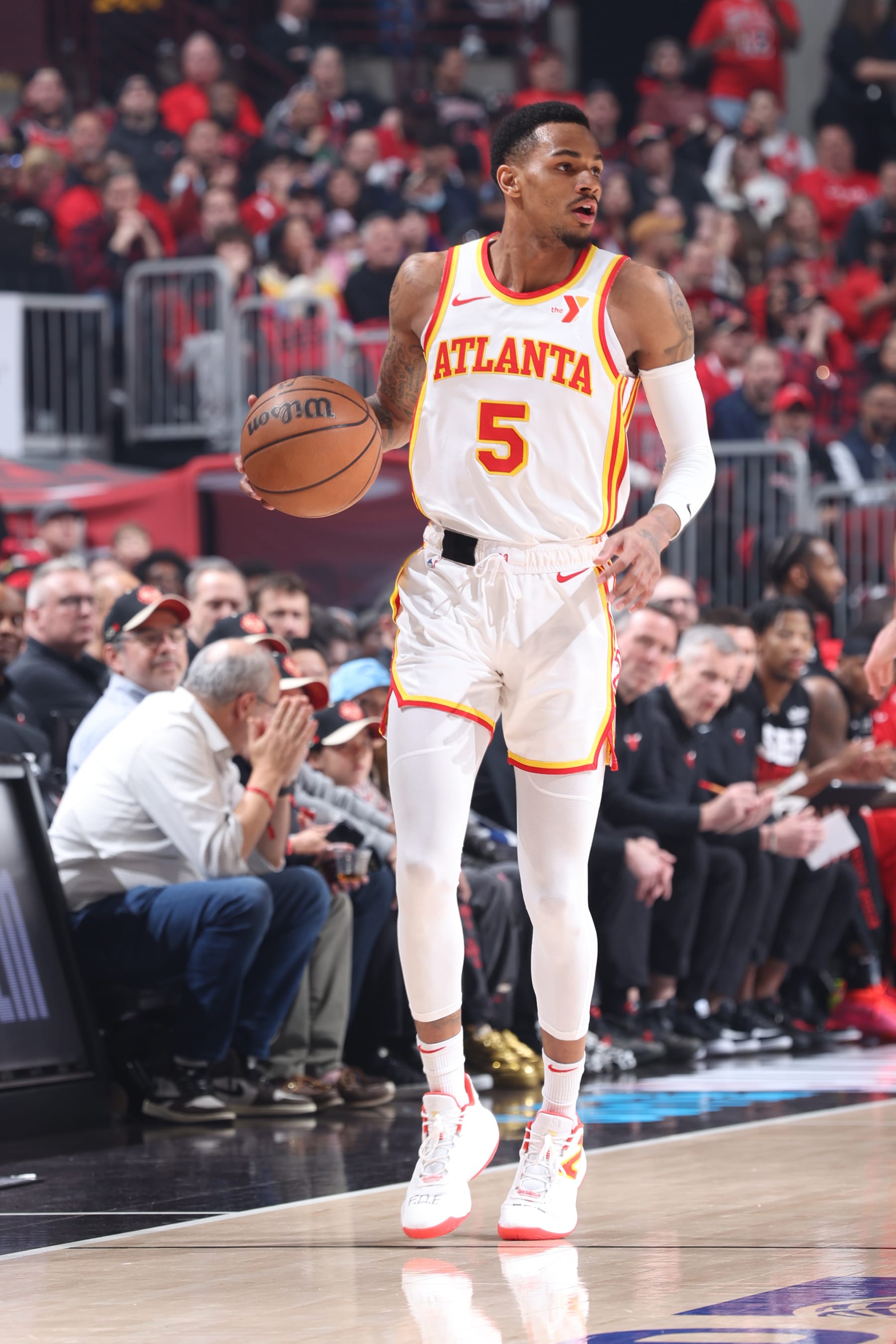 CHICAGO, IL - APRIL 17:  Dejounte Murray #5 of the Atlanta Hawks handles the ball during the game against the Chicago Bulls  during the 2024 Play-In Tournament  on April 17, 2024 at United Center in Chicago, Illinois. NOTE TO USER: User expressly acknowledges and agrees that, by downloading and or using this photograph, User is consenting to the terms and conditions of the Getty Images License Agreement. Mandatory Copyright Notice: Copyright 2024 NBAE (Photo by Jeff Haynes/NBAE via Getty Images)