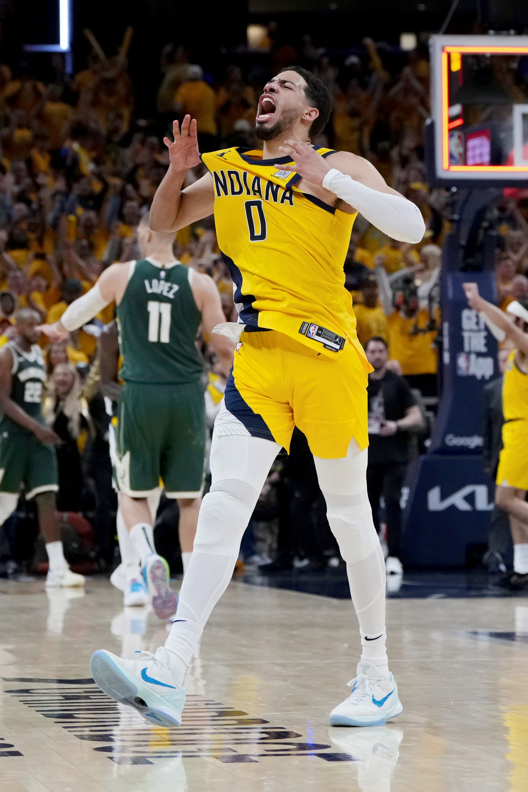 INDIANAPOLIS, INDIANA - APRIL 26: Tyrese Haliburton #0 of the Indiana Pacers celebrates after beating the Milwaukee Bucks 121-119 in overtime during game three of the Eastern Conference First Round Playoffs at Gainbridge Fieldhouse on April 26, 2024 in Indianapolis, Indiana. NOTE TO USER: User expressly acknowledges and agrees that, by downloading and or using this photograph, User is consenting to the terms and conditions of the Getty Images License Agreement. (Photo by Dylan Buell/Getty Images)