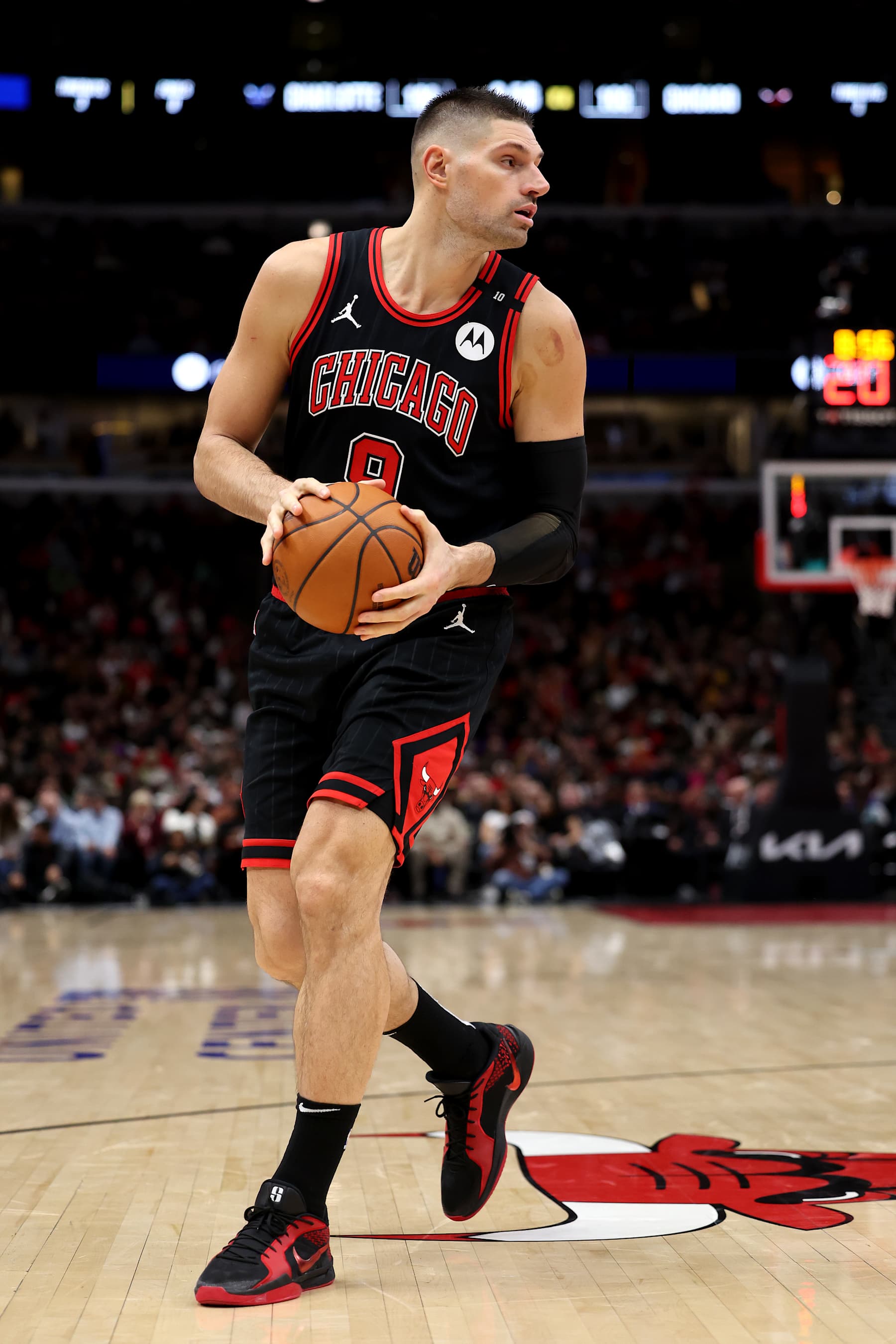 CHICAGO, ILLINOIS - JANUARY 17: Nikola Vucevic #9 of the Chicago Bulls in action against the Charlotte Hornets at the United Center on January 17, 2025 in Chicago, Illinois. NOTE TO USER: User expressly acknowledges and agrees that, by downloading and or using this photograph, user is consenting to the terms and conditions of the Getty Images License Agreement.  (Photo by Luke Hales/Getty Images)