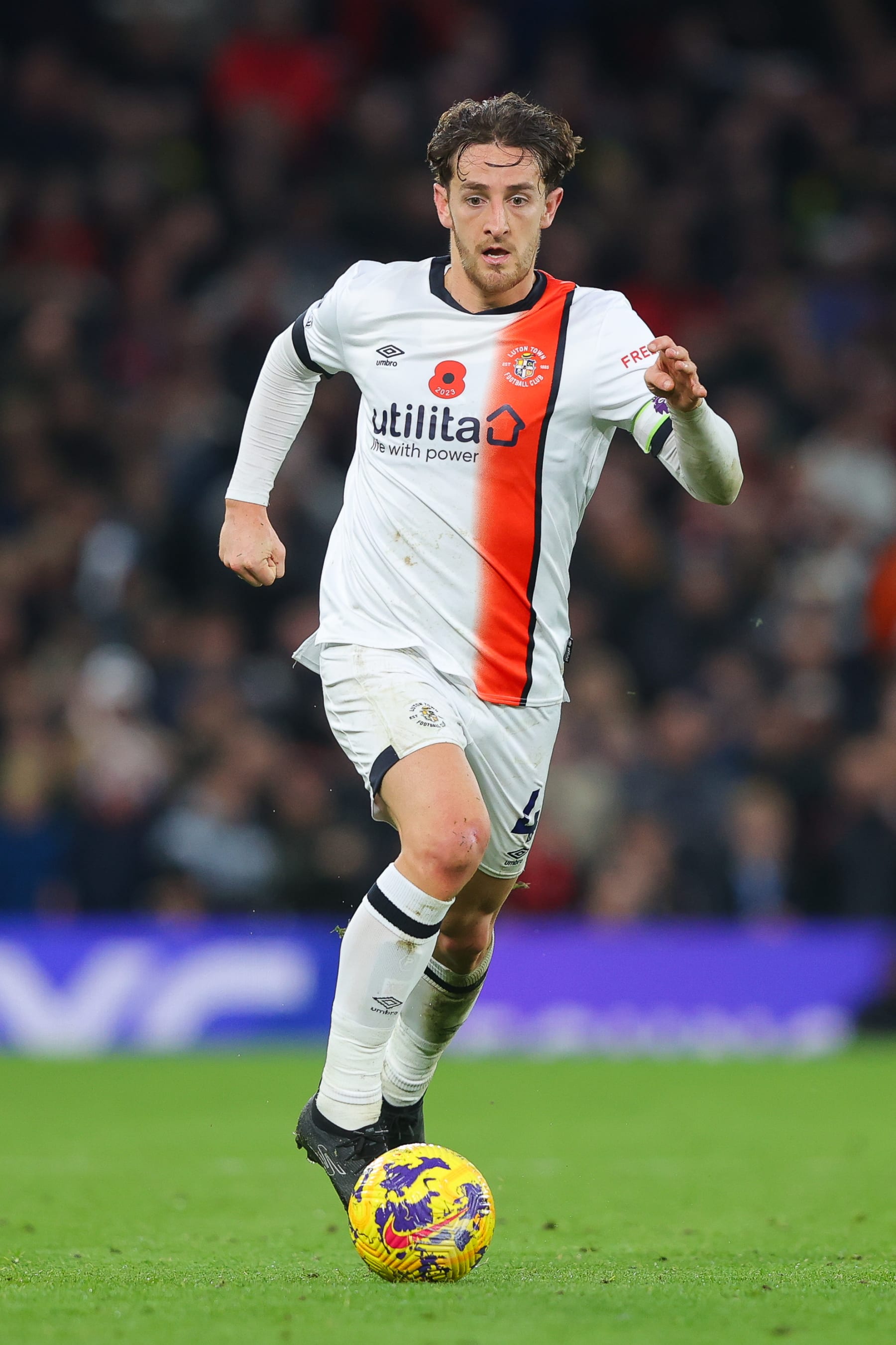 MANCHESTER, ENGLAND - NOVEMBER 11: Tom Lockyer of Luton Town during the Premier League match between Manchester United and Luton Town at Old Trafford on November 11, 2023 in Manchester, England. (Photo by James Gill - Danehouse/Getty Images)