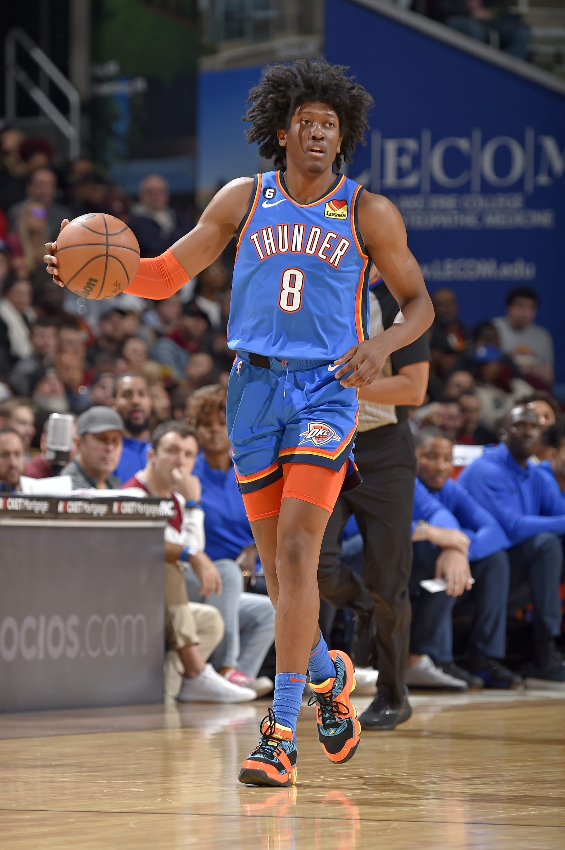 CLEVELAND, OH - DECEMBER 10: Jalen Williams #8 of the Oklahoma City Thunder dribbles the ball against the Cleveland Cavaliers on December 10, 2022 at Rocket Mortgage FieldHouse in Cleveland, Ohio. NOTE TO USER: User expressly acknowledges and agrees that, by downloading and/or using this Photograph, user is consenting to the terms and conditions of the Getty Images License Agreement. Mandatory Copyright Notice: Copyright 2022 NBAE (Photo by David Liam Kyle/NBAE via Getty Images)