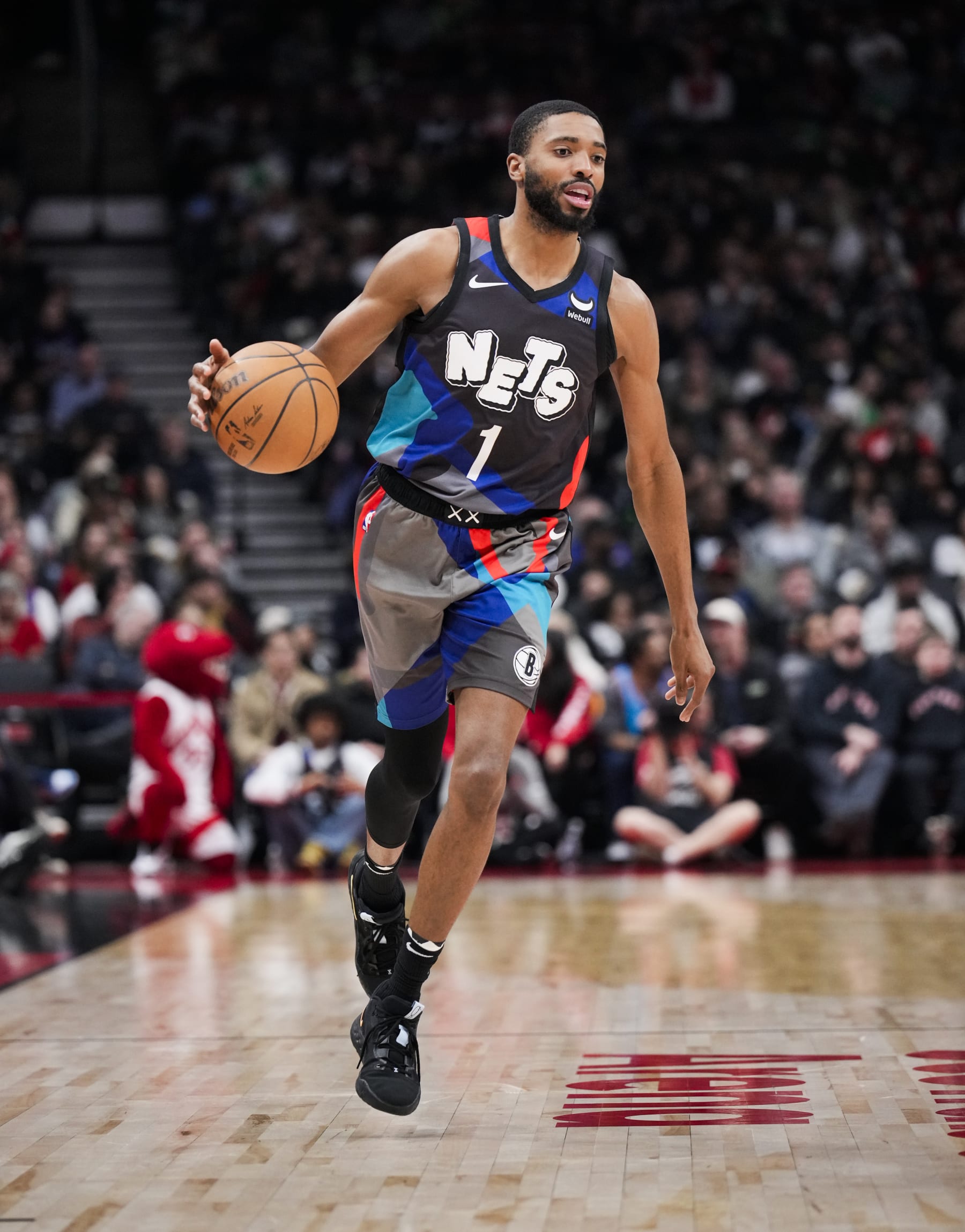TORONTO, ON - MARCH 25: Mikal Bridges #1 of the Brooklyn Nets dribbles against the Toronto Raptors during the first half of their basketball game at the Scotiabank Arena on March 25, 2024 in Toronto, Ontario, Canada. NOTE TO USER: User expressly acknowledges and agrees that, by downloading and/or using this Photograph, user is consenting to the terms and conditions of the Getty Images License Agreement. (Photo by Mark Blinch/Getty Images)