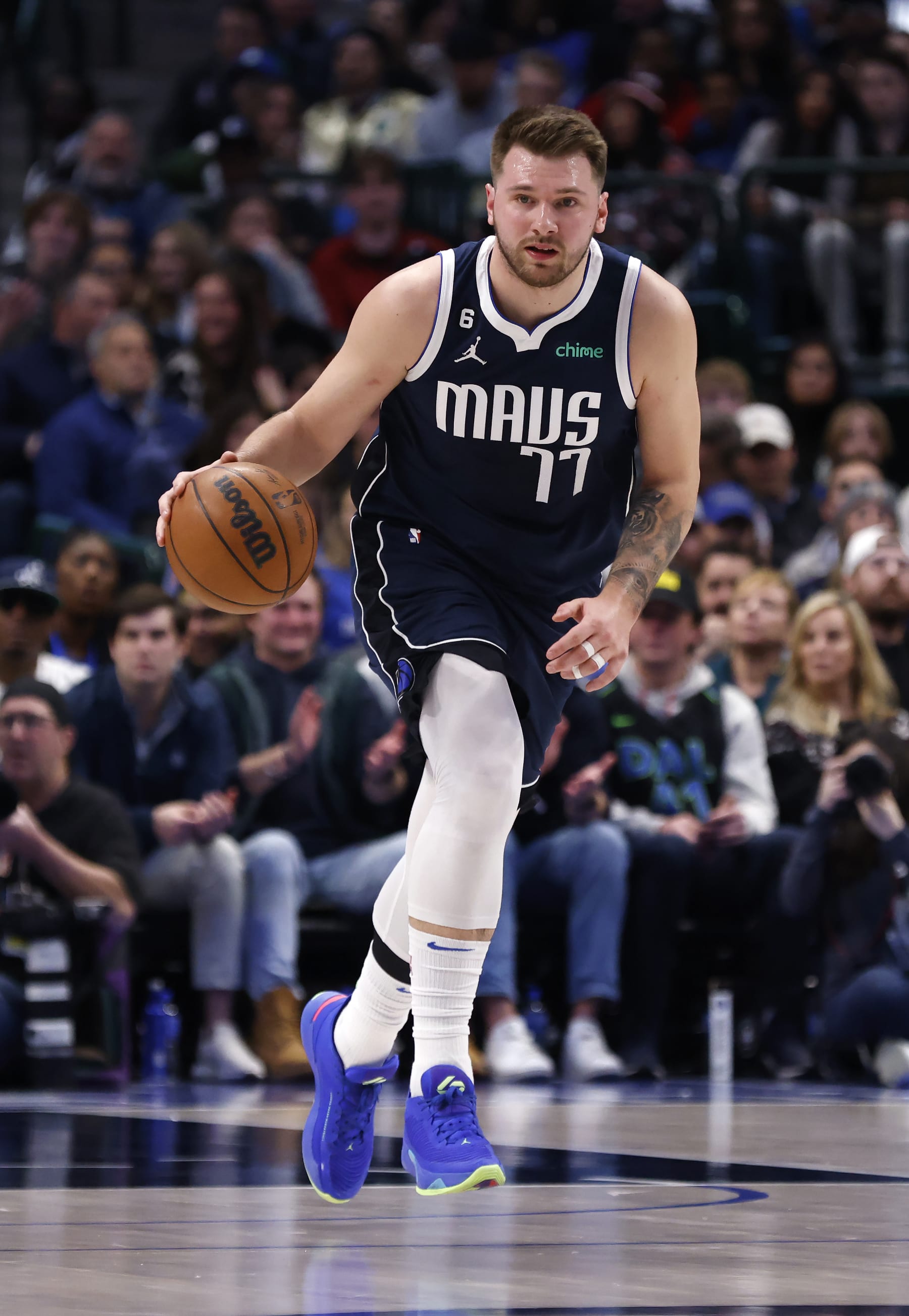DALLAS, TX - FEBRUARY 2: Luka Doncic #77 of the Dallas Mavericks brings the ball up the court against the New Orleans Pelicans in the first half at American Airlines Center on February 2, 2023 in Dallas, Texas. NOTE TO USER: User expressly acknowledges and agrees that, by downloading and or using this photograph, user is consenting to the terms and conditions of the Getty Images License Agreement. (Photo by Ron Jenkins/Getty Images)