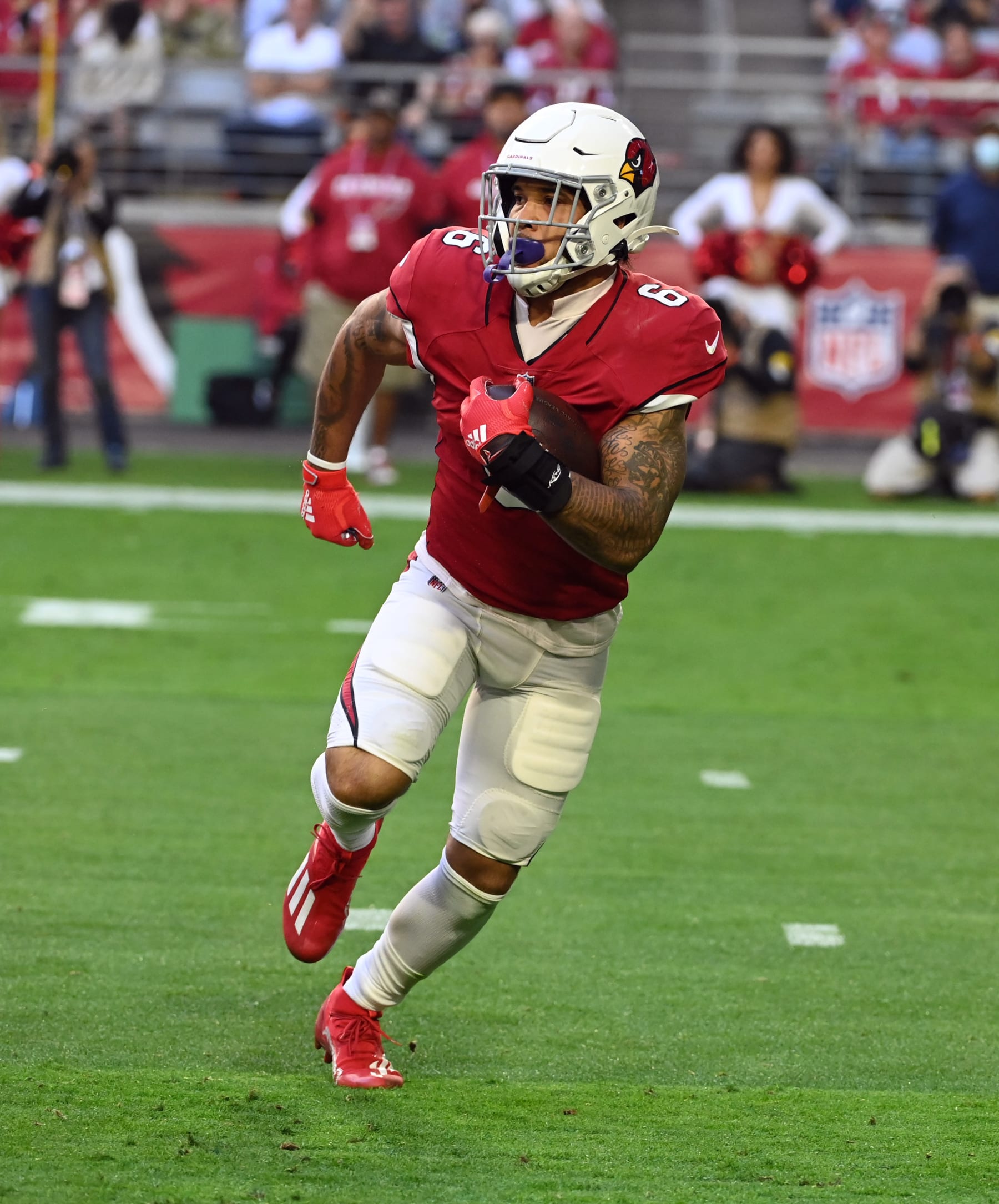 GLENDALE, ARIZONA - JANUARY 09: James Connor #6 of the Arizona Cardinals runs with the ball against the Seattle Seahawks at State Farm Stadium on January 09, 2022 in Glendale, Arizona. (Photo by Norm Hall/Getty Images)