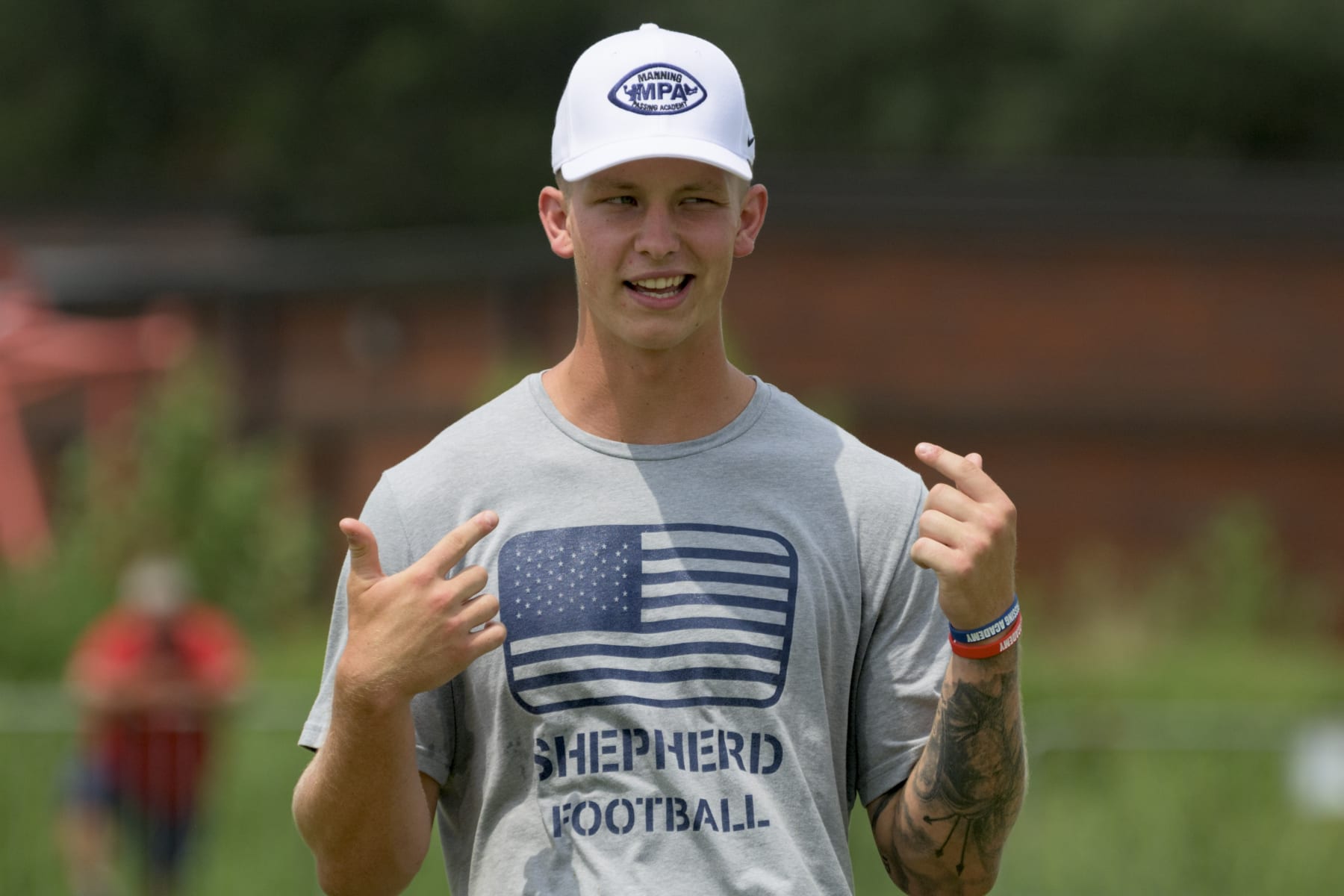 Shepherdquarterback Tyson Bagent tells to campers to look at him at the Manning Passing Academy on the Nicholls State University campus in Thibodaux, La. Saturday, June 25, 2022. (AP Photo/Matthew Hinton)