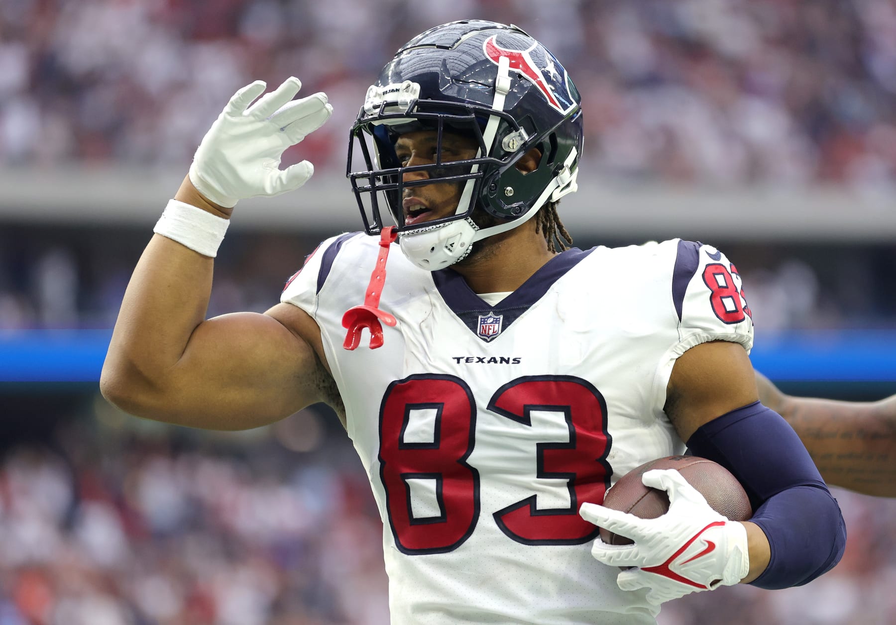 HOUSTON, TEXAS - SEPTEMBER 11: O.J. Howard #83 of the Houston Texans celebrates scoring a touchdown during the third quarter against the Indianapolis Colts at NRG Stadium on September 11, 2022 in Houston, Texas. (Photo by Carmen Mandato/Getty Images)