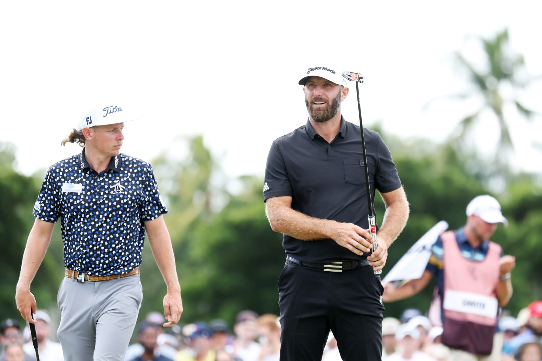 DORAL, FLORIDA - OCTOBER 30: Team Captain Cameron Smith of Punch GC and team Captain Dustin Johnson of 4 Aces GC are seen on the sixth green during the team championship stroke-play round of the LIV Golf Invitational - Miami at Trump National Doral Miami on October 30, 2022 in Doral, Florida. (Photo by Joe Scarnici/LIV Golf via Getty Images)