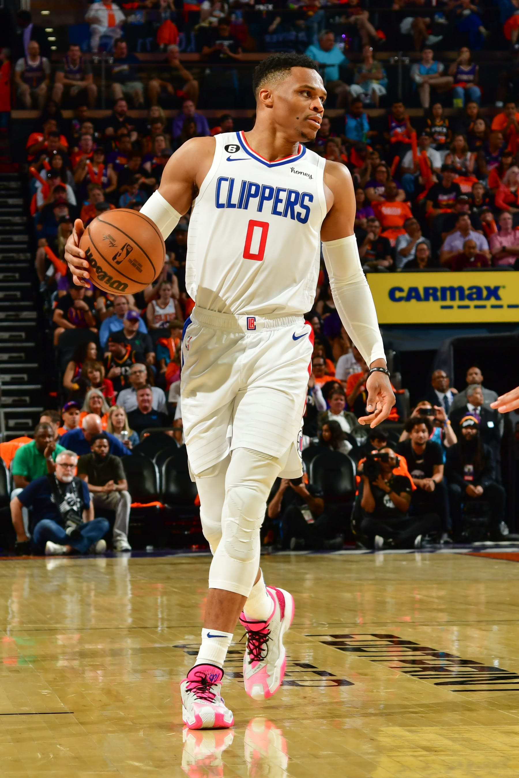 PHOENIX, AZ - APRIL 25:  Russell Westbrook #0 of the LA Clippers handles the ball during the game  during round one game five of the 2023 NBA Playoffs on on April 25, 2023 at Footprint Center in Phoenix, Arizona. NOTE TO USER: User expressly acknowledges and agrees that, by downloading and or using this photograph, user is consenting to the terms and conditions of the Getty Images License Agreement. Mandatory Copyright Notice: Copyright 2023 NBAE (Photo by Kate Frese/NBAE via Getty Images)