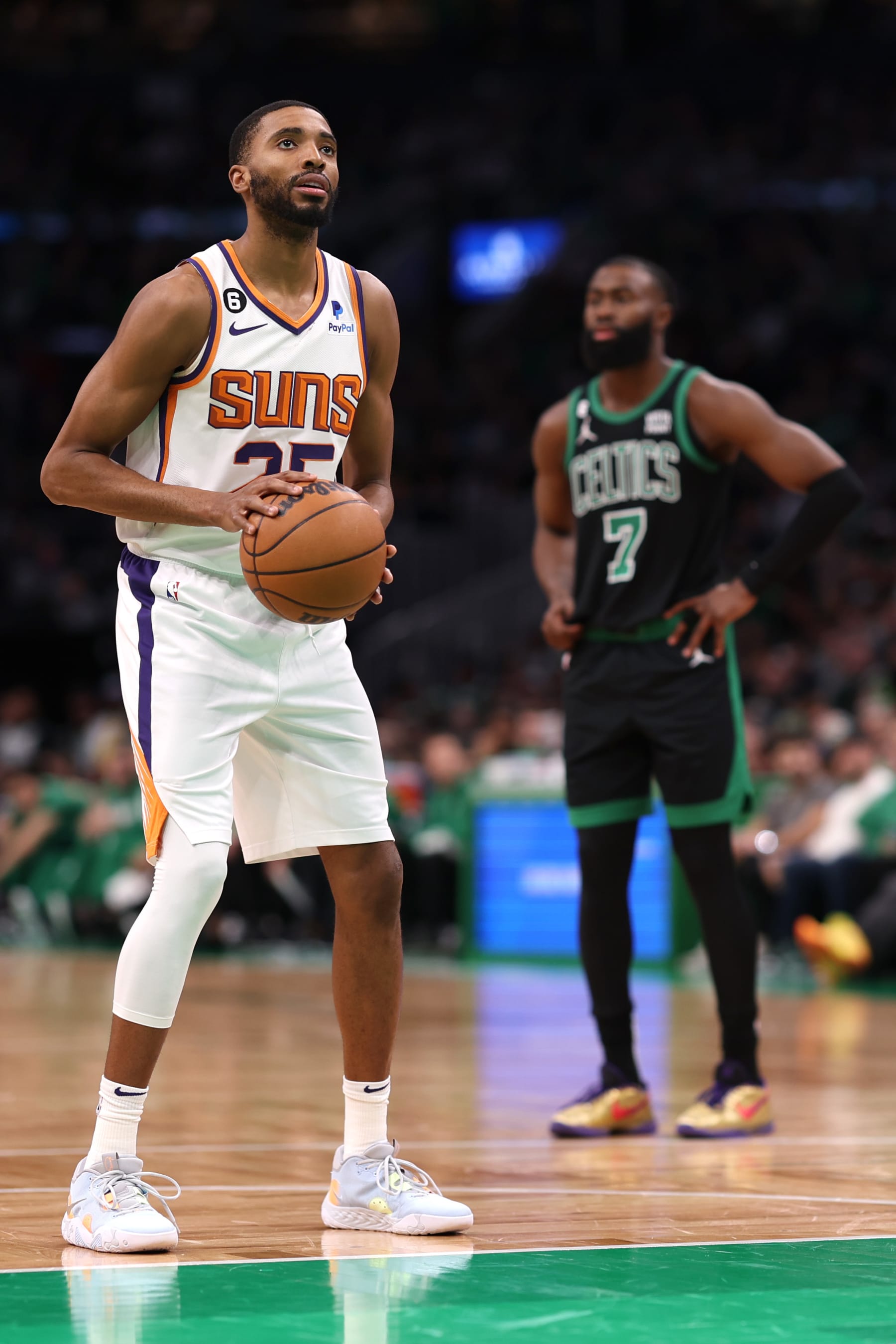 BOSTON, MASSACHUSETTS - FEBRUARY 03:  Mikal Bridges #25 of the Phoenix Suns takes a free throw against the Boston Celtics at TD Garden on February 03, 2023 in Boston, Massachusetts. NOTE TO USER: User expressly acknowledges and agrees that, by downloading and or using this photograph, User is consenting to the terms and conditions of the Getty Images License Agreement. (Photo by Maddie Meyer/Getty Images)