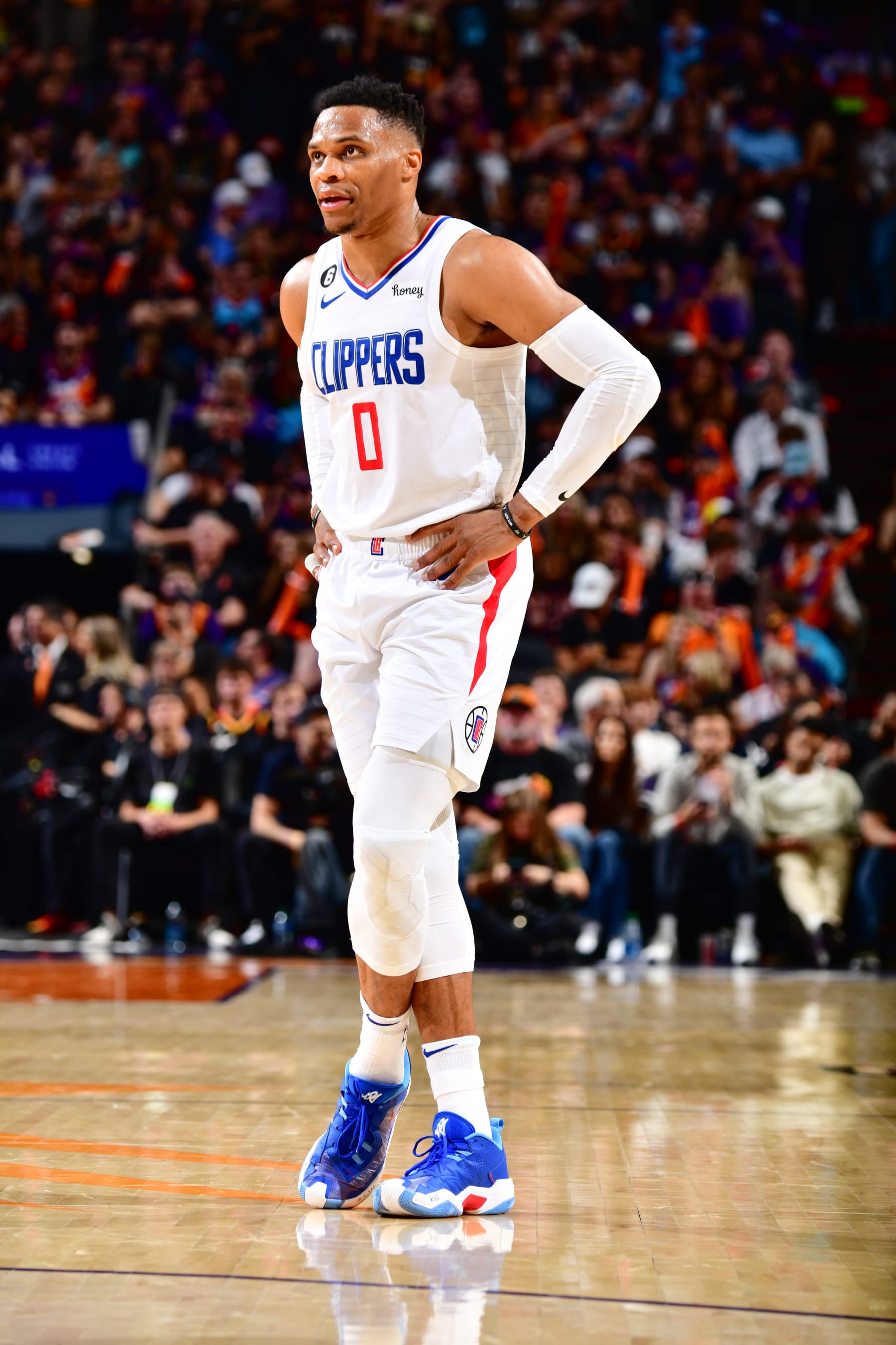 PHOENIX, AZ - APRIL 16:  Russell Westbrook #0 of the LA Clippers looks on during the game During round one game one of the 2023 NBA Playoffs on April 16, 2023 at Footprint Center in Phoenix, Arizona. NOTE TO USER: User expressly acknowledges and agrees that, by downloading and or using this photograph, user is consenting to the terms and conditions of the Getty Images License Agreement. Mandatory Copyright Notice: Copyright 2023 NBAE (Photo by Barry Gossage/NBAE via Getty Images)