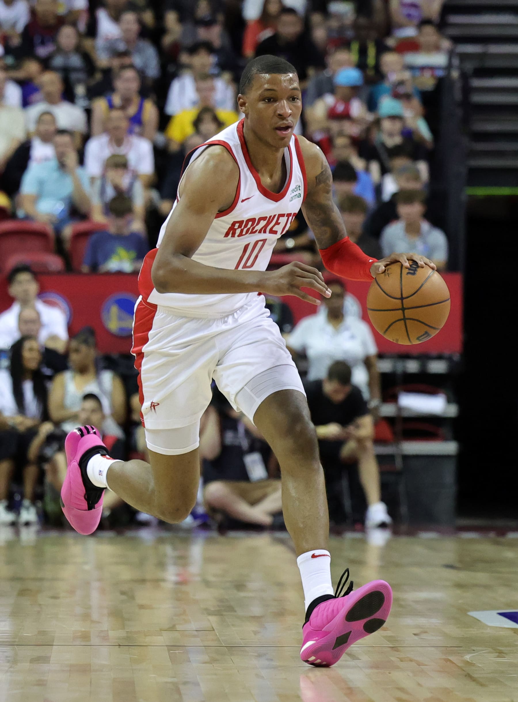 LAS VEGAS, NEVADA - JULY 09: Jabari Smith Jr. #10 of the Houston Rockets brings the ball up the court against the Detroit Pistons in the first half of a 2023 NBA Summer League game at the Thomas & Mack Center on July 09, 2023 in Las Vegas, Nevada. NOTE TO USER: User expressly acknowledges and agrees that, by downloading and or using this photograph, User is consenting to the terms and conditions of the Getty Images License Agreement. (Photo by Ethan Miller/Getty Images) (Photo by Ethan Miller/Getty Images)