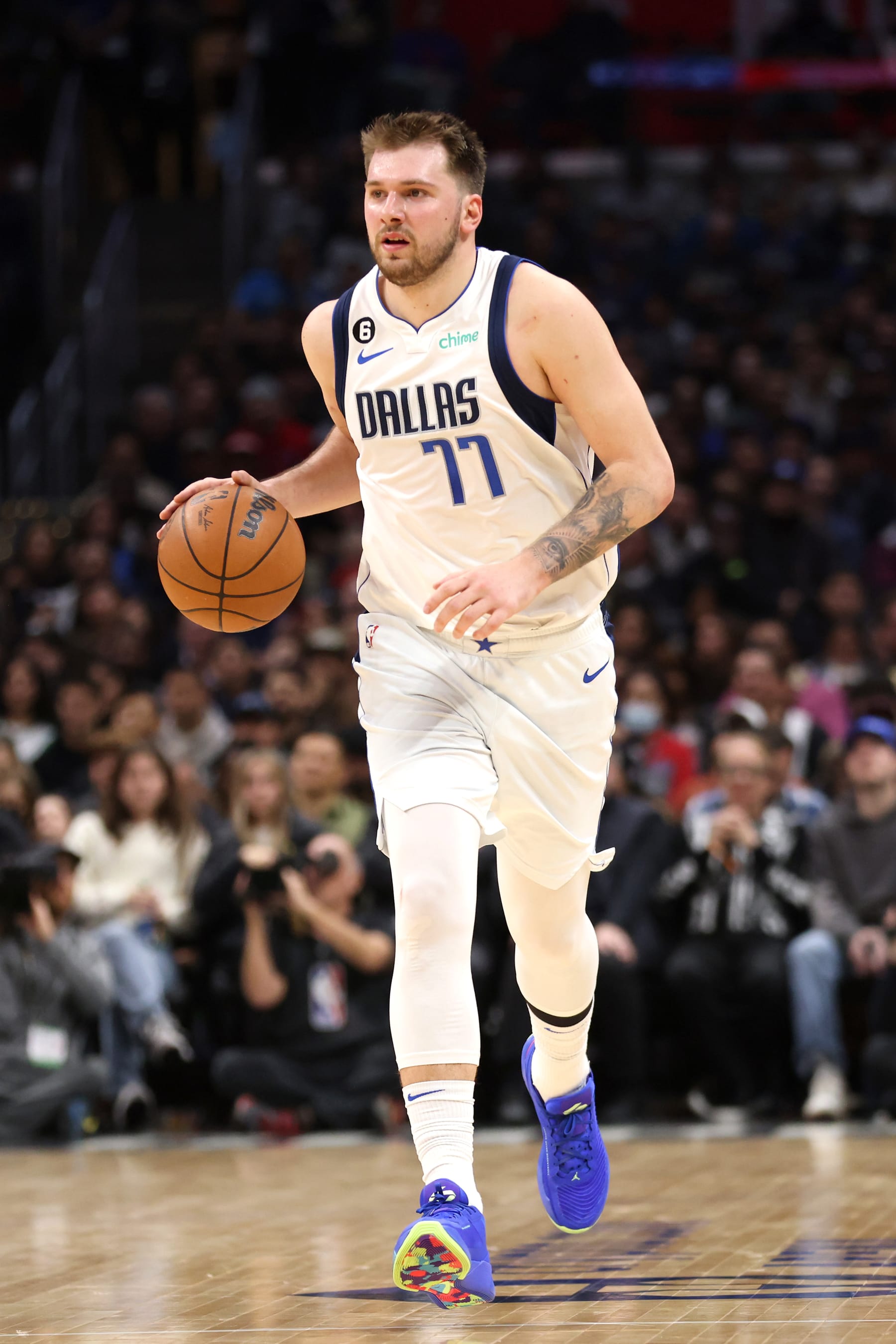 LOS ANGELES, CALIFORNIA - JANUARY 10: Luka Doncic #77 of the Dallas Mavericks brings the ball up court during the third quarter against the Los Angeles Clippers at Crypto.com Arena on January 10, 2023 in Los Angeles, California. NOTE TO USER: User expressly acknowledges and agrees that, by downloading and or using this photograph, User is consenting to the terms and conditions of the Getty Images License Agreement. (Photo by Katelyn Mulcahy/Getty Images)