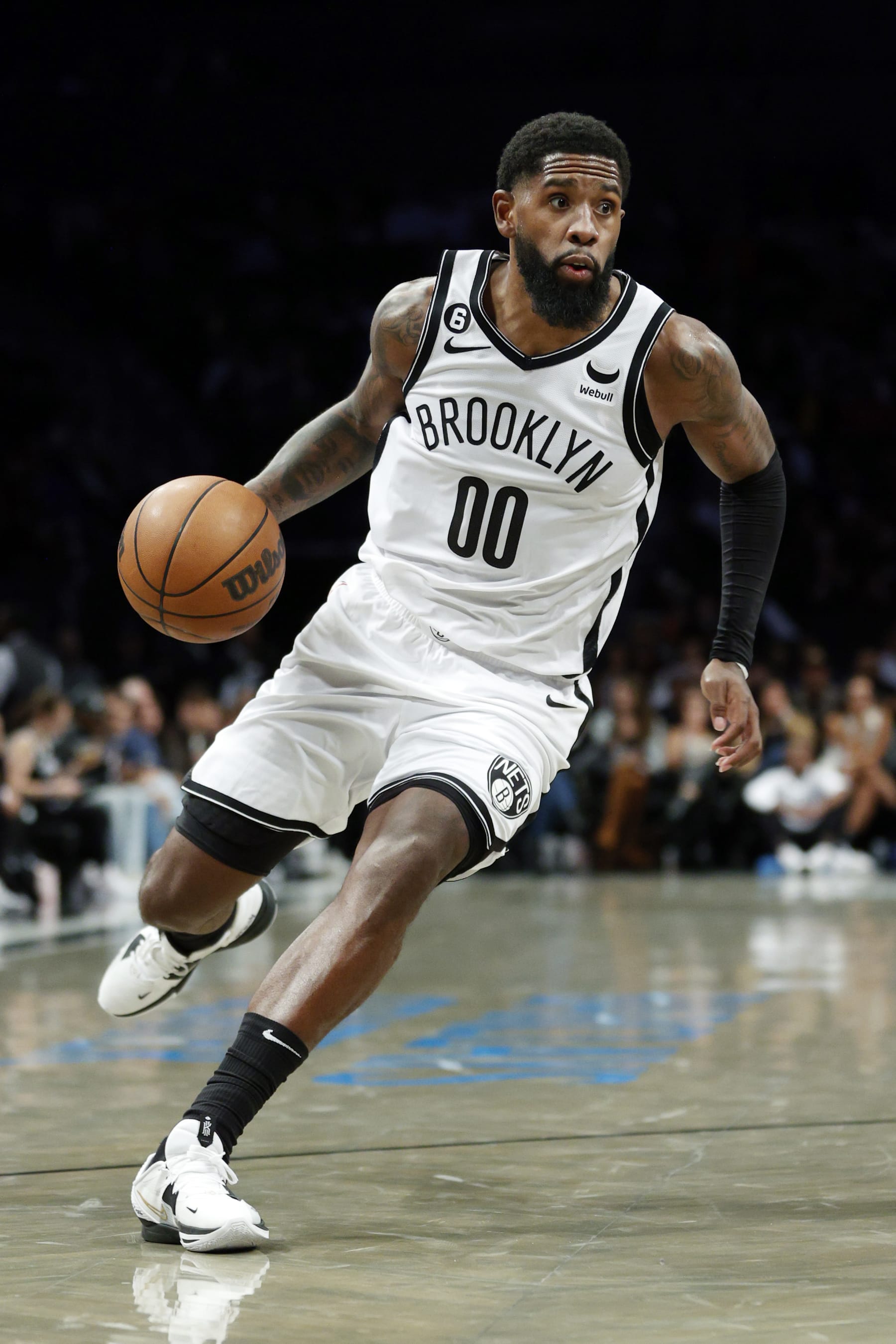 NEW YORK, NEW YORK - OCTOBER 06: Royce O'Neale #00 of the Brooklyn Nets dribbles during the second half against the Miami Heat at Barclays Center on October 06, 2022 in the Brooklyn borough of New York City. NOTE TO USER: User expressly acknowledges and agrees that, by downloading and or using this photograph, User is consenting to the terms and conditions of the Getty Images License Agreement. (Photo by Sarah Stier/Getty Images)