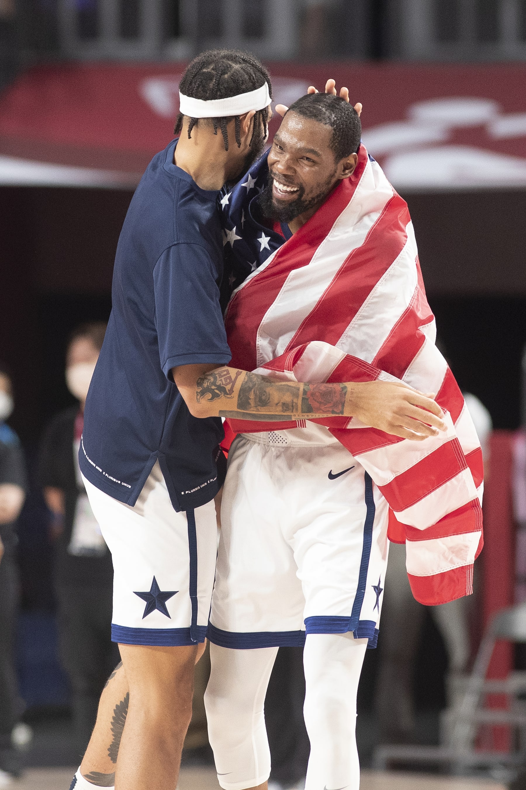TOKYO, JAPAN August 7  Kevin Durant #7 of the United States celebrates with team mate Javale McGee #11 of the United States after the teams gold medal victory during the France V USA basket final for men at the Saitama Super Arena during the Tokyo 2020 Summer Olympic Games on August 7, 2021 in Tokyo, Japan. (Photo by Tim Clayton/Corbis via Getty Images)