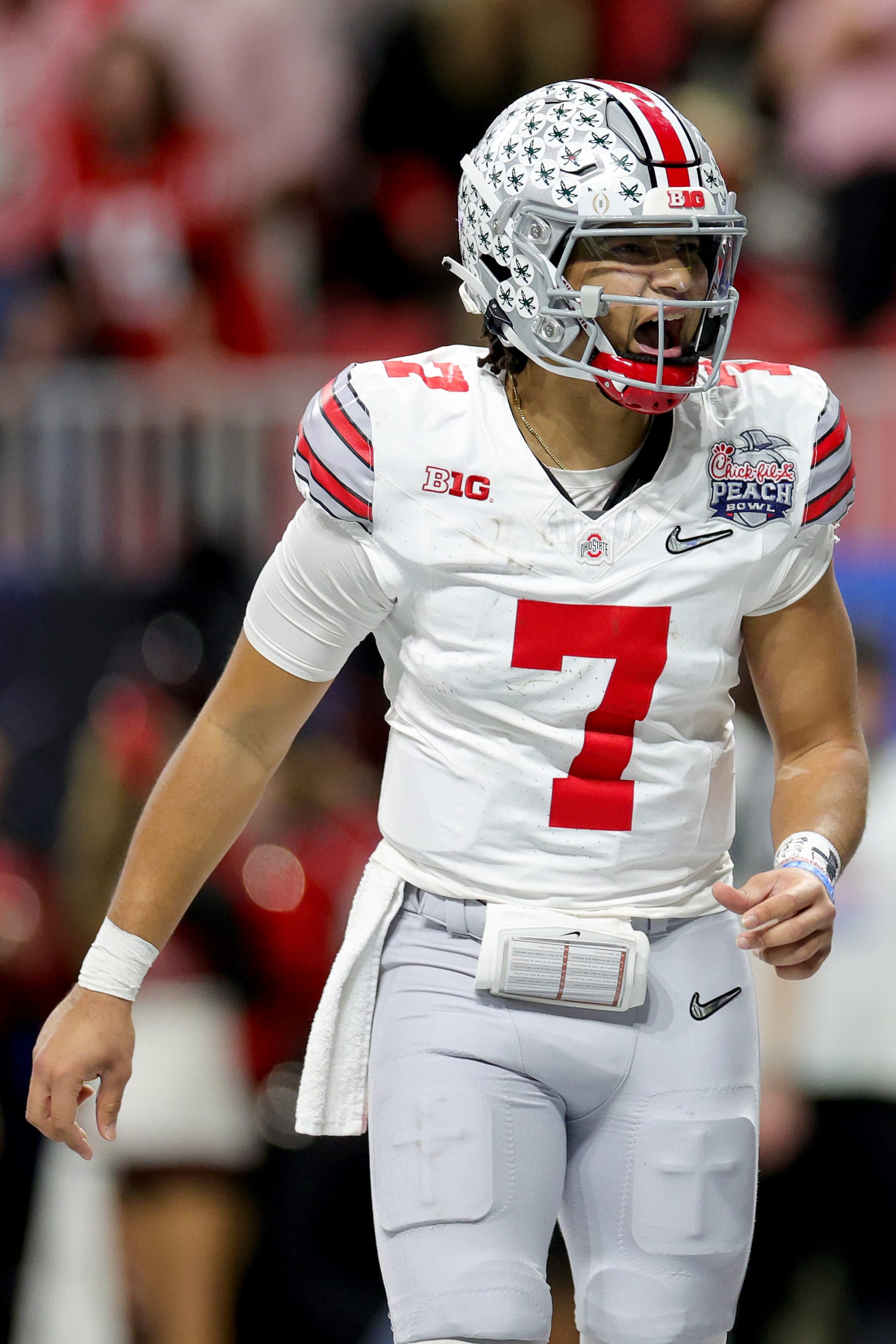 ATLANTA, GEORGIA - DECEMBER 31: C.J. Stroud #7 of the Ohio State Buckeyes reacts after a touchdown during the second quarter against the Georgia Bulldogs in the Chick-fil-A Peach Bowl at Mercedes-Benz Stadium on December 31, 2022 in Atlanta, Georgia. (Photo by Carmen Mandato/Getty Images)
