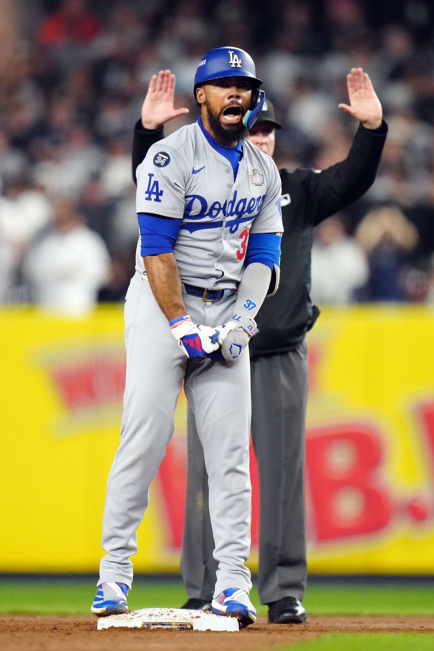 NEW YORK, NY - OCTOBER 30: Teoscar Hernández #37 of the Los Angeles Dodgers reacts after hitting a two-run double in the fifth inning during Game 5 of the 2024 World Series presented by Capital One between the Los Angeles Dodgers and the New York Yankees at Yankee Stadium on Wednesday, October 30, 2024 in New York, New York. (Photo by Daniel Shirey/MLB Photos via Getty Images)