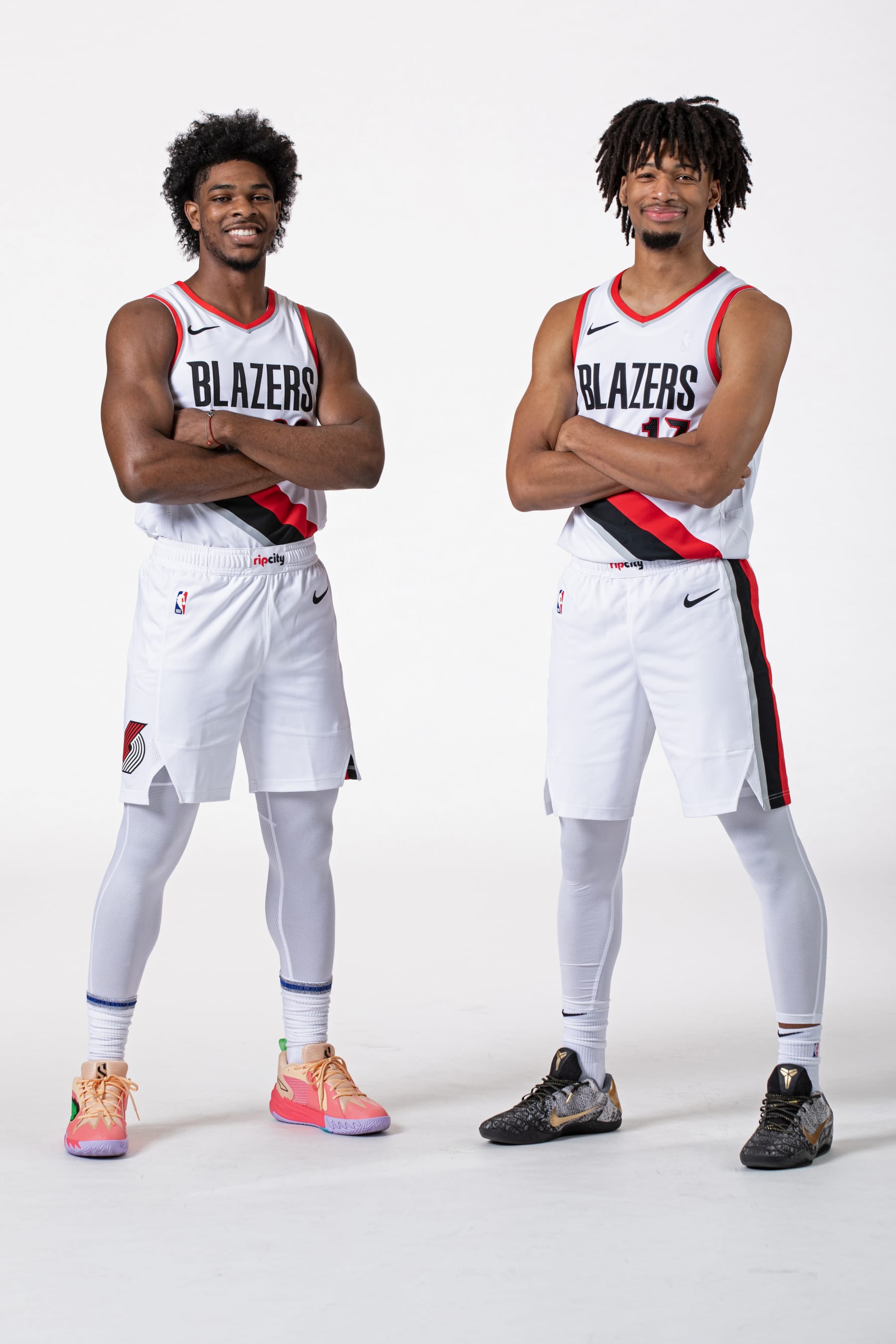 PORTLAND, OR - OCTOBER 2: Scoot Henderson #00 and Shaedon Sharpe #17 of the Portland Trail Blazers poses for a portrait during 2023-24 NBA Media Day on October 2, 2023 at the Moda Center Arena in Portland, Oregon. NOTE TO USER: User expressly acknowledges and agrees that, by downloading and or using this photograph, user is consenting to the terms and conditions of the Getty Images License Agreement. Mandatory Copyright Notice: Copyright 2023 NBAE (Photo by Cameron Browne/NBAE via Getty Images)