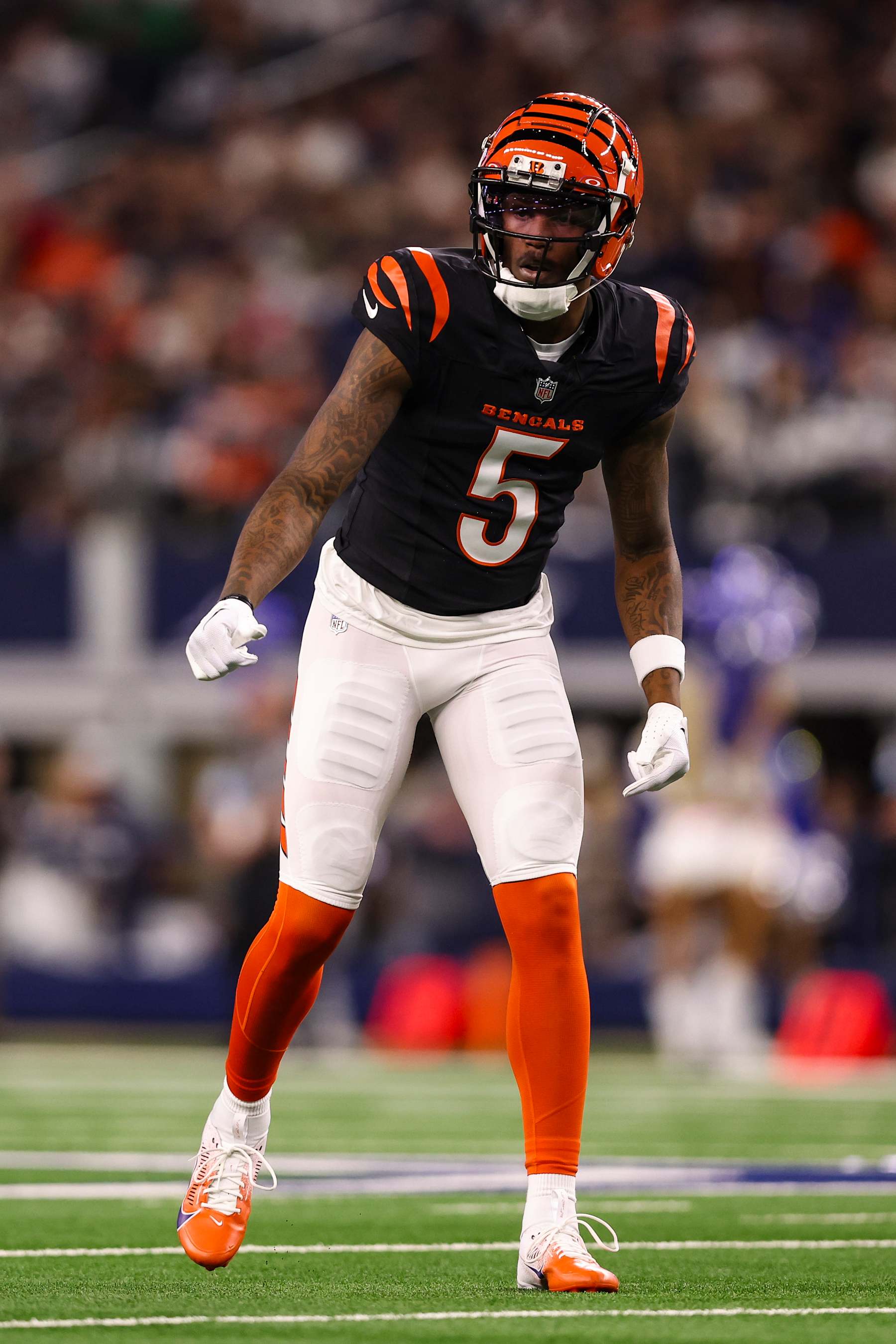 ARLINGTON, TEXAS - DECEMBER 09: Tee Higgins #5 of the Cincinnati Bengals lines up before the snap during an NFL football game against the Dallas Cowboys at AT&T Stadium on December 9, 2024 in Arlington, Texas. (Photo by Perry Knotts/Getty Images)