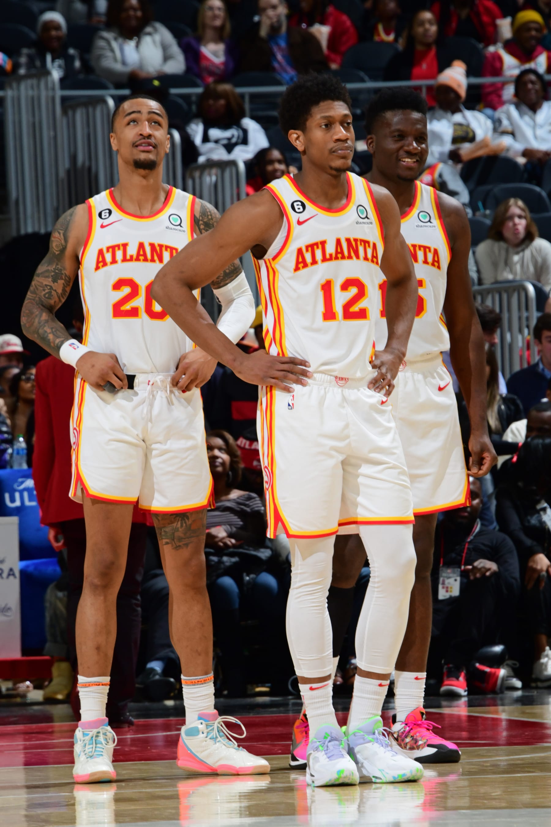 John Collins, De'Andre Hunter and Clint Capela