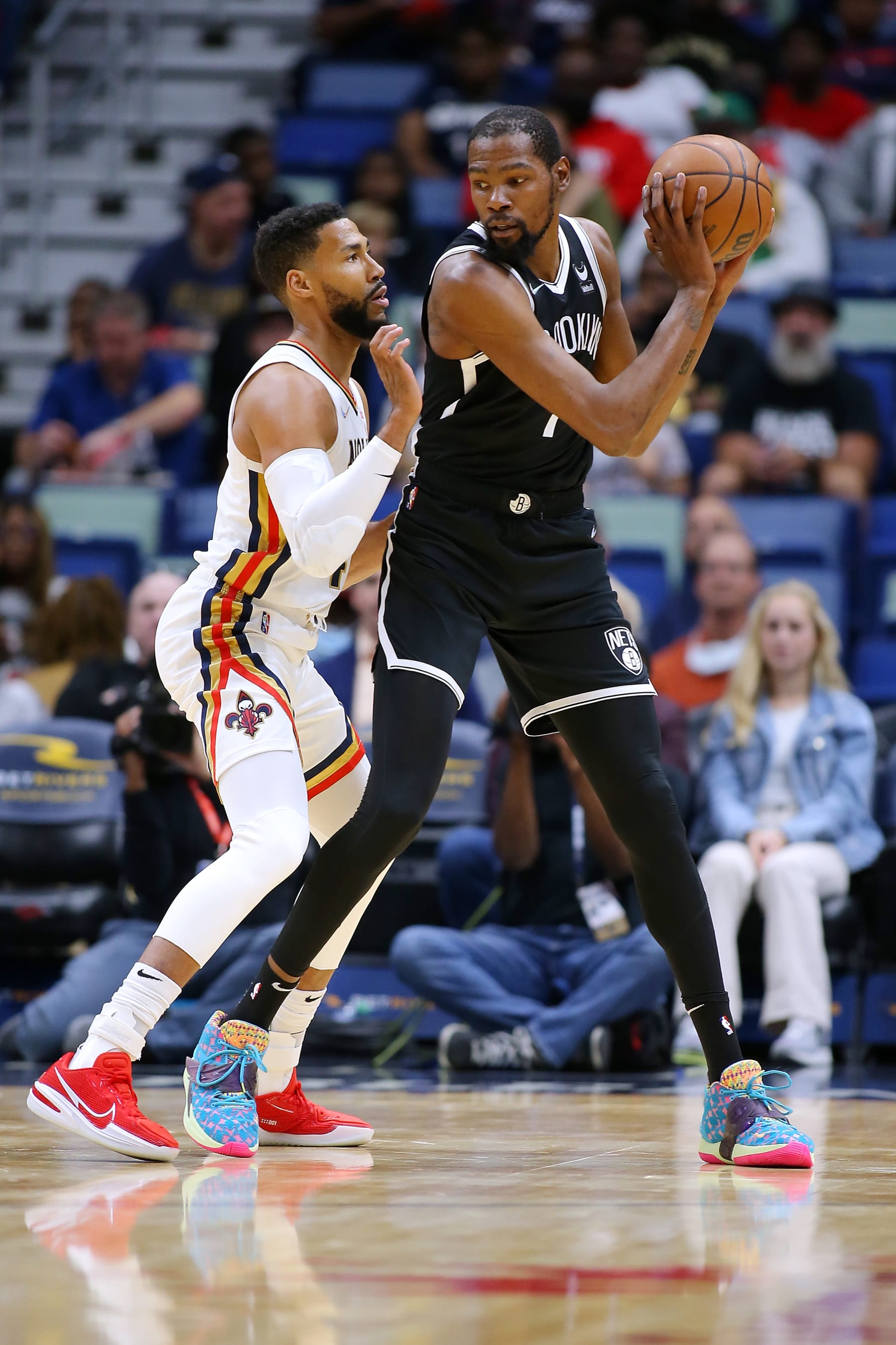 NEW ORLEANS, LOUISIANA - NOVEMBER 12: Kevin Durant #7 of the Brooklyn Nets drives against Garrett Temple #41 of the New Orleans Pelicans during a game at the Smoothie King Center on November 12, 2021 in New Orleans, Louisiana. NOTE TO USER: User expressly acknowledges and agrees that, by downloading and or using this Photograph, user is consenting to the terms and conditions of the Getty Images License Agreement. (Photo by Jonathan Bachman/Getty Images)