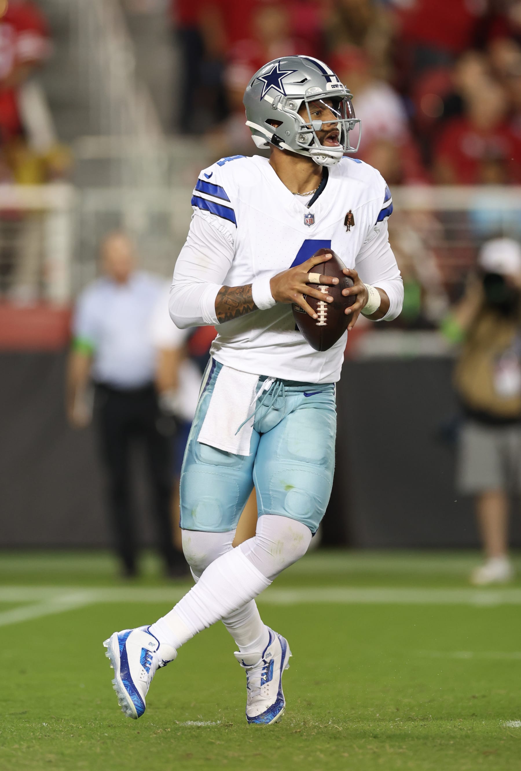 SANTA CLARA, CALIFORNIA - OCTOBER 08: Dak Prescott #4 of the Dallas Cowboys looks to pass during the fourth quarter against the San Francisco 49ers at Levi's Stadium on October 08, 2023 in Santa Clara, California. (Photo by Ezra Shaw/Getty Images)