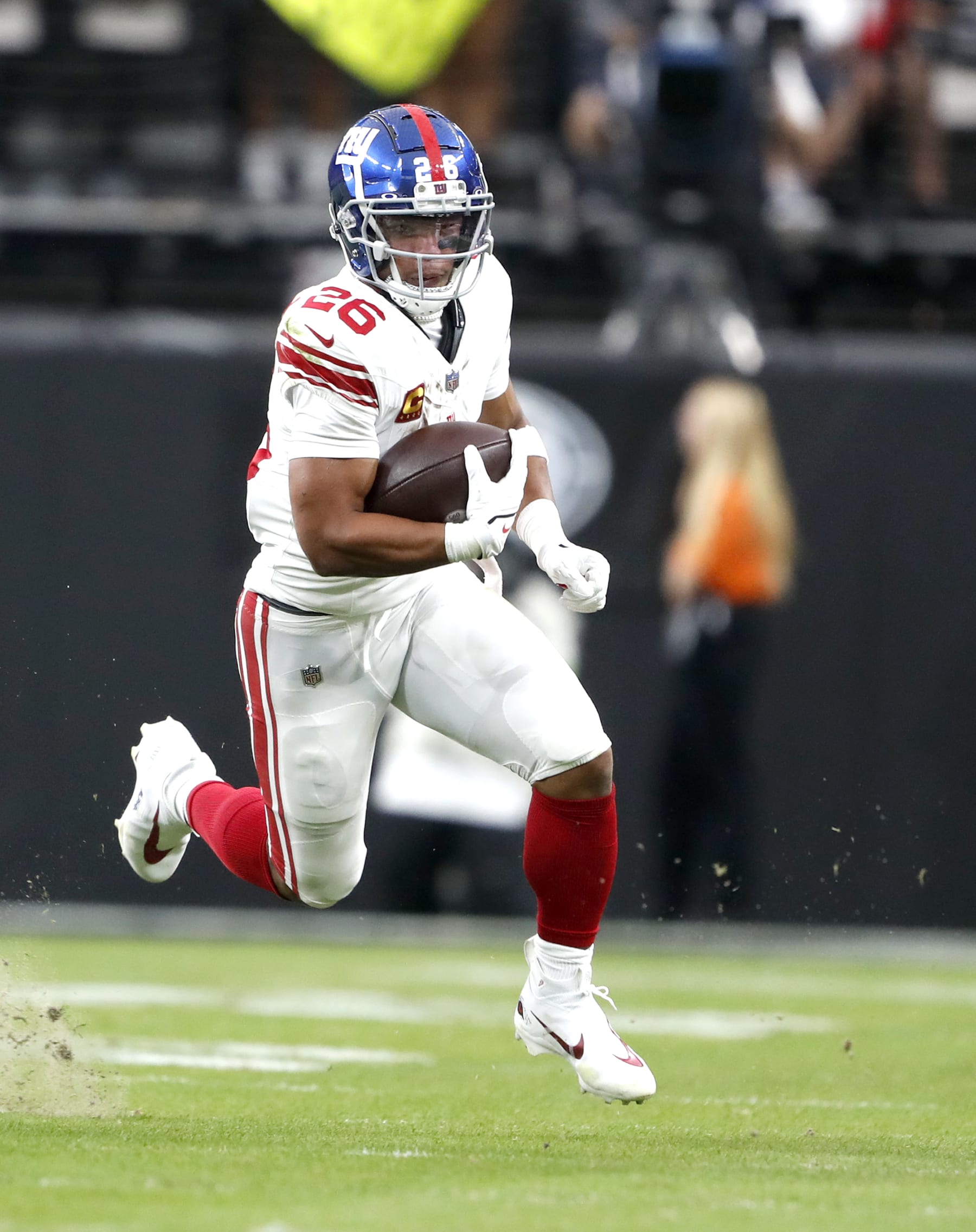 LAS VEGAS, NEVADA - NOVEMBER 05: Running back Saquon Barkley #26 of the New York Giants carries the ball against the Las Vegas Raiders at Allegiant Stadium on November 05, 2023 in Las Vegas, Nevada. The Raiders defeated the Giants 30-6. (Photo by Steve Marcus/Getty Images)