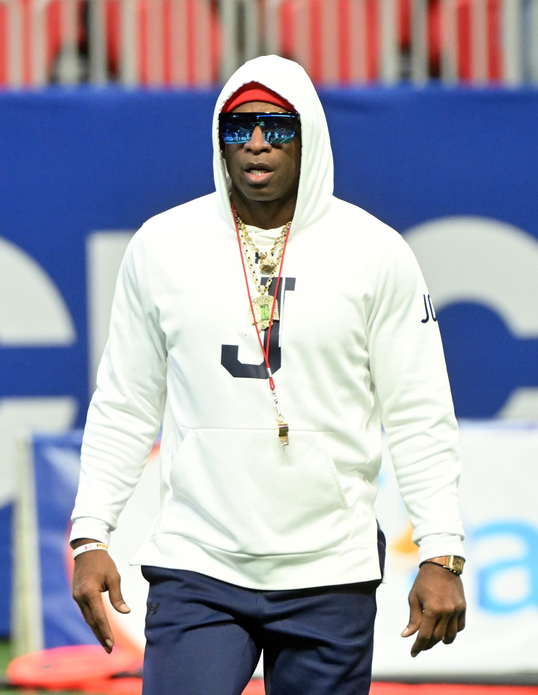 ATLANTA, GEORGIA - DECEMBER 17: Head coach Deion Sanders of the Jackson State Tigers walks the field during pregame warmups prior to the Cricket Celebration Bowl against the North Carolina Central Eagles at Mercedes-Benz Stadium on December 17, 2022 in Atlanta, Georgia. (Photo by Paras Griffin/Getty Images)