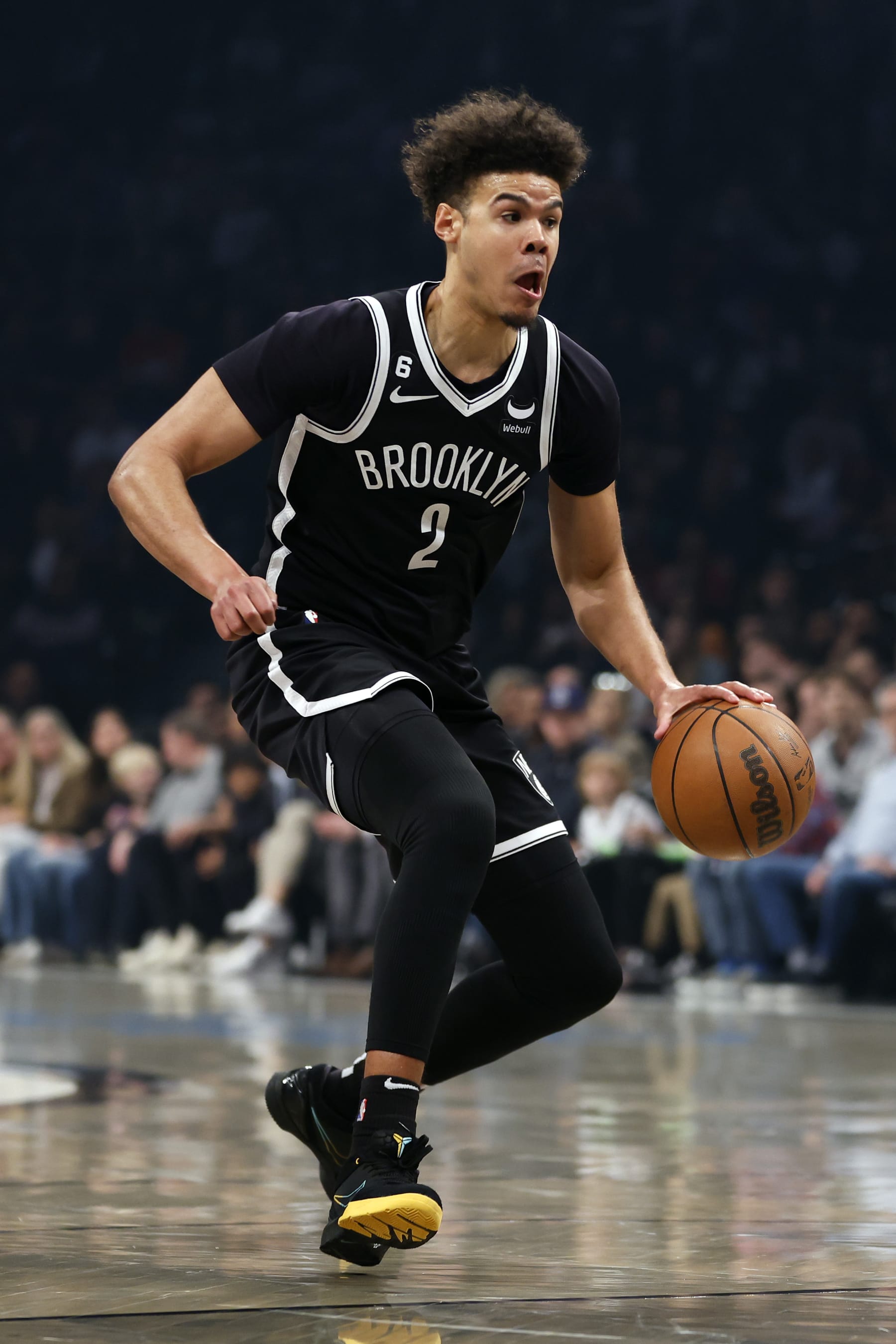 NEW YORK, NEW YORK - APRIL 22: Cameron Johnson #2 of the Brooklyn Nets dribbles against the Philadelphia 76ers during the first half of Game Four of the Eastern Conference First Round Playoffs at Barclays Center on April 22, 2023 in the Brooklyn borough of New York City. NOTE TO USER: User expressly acknowledges and agrees that, by downloading and or using this photograph, User is consenting to the terms and conditions of the Getty Images License Agreement. (Photo by Sarah Stier/Getty Images)