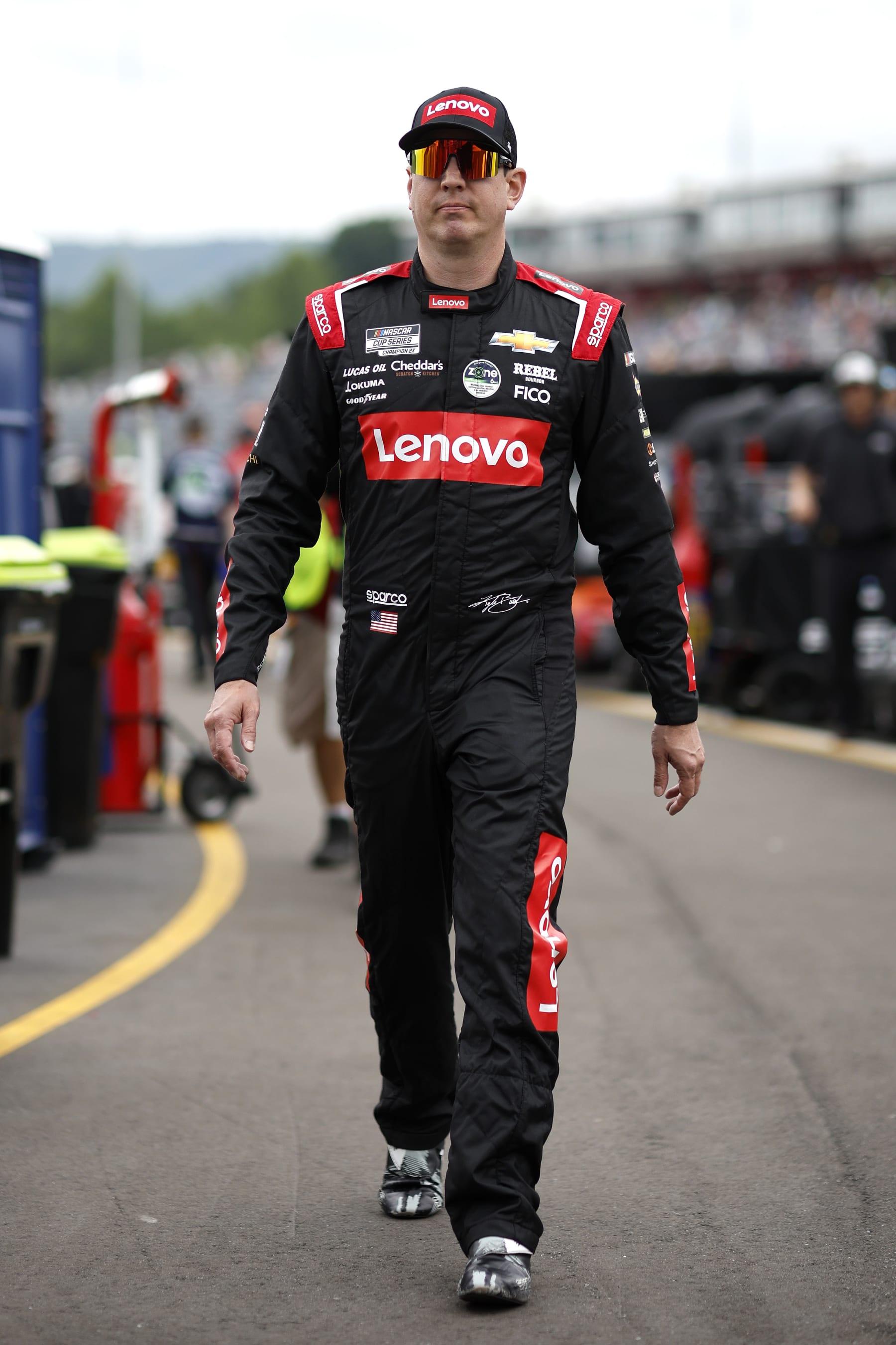 NORTH WILKESBORO, NORTH CAROLINA - MAY 17: Kyle Busch, driver of the #8 Lenovo Chevrolet, walks the grid during practice for the NASCAR Cup Series All-Star Race at North Wilkesboro Speedway on May 17, 2024 in North Wilkesboro, North Carolina. (Photo by Sean Gardner/Getty Images)