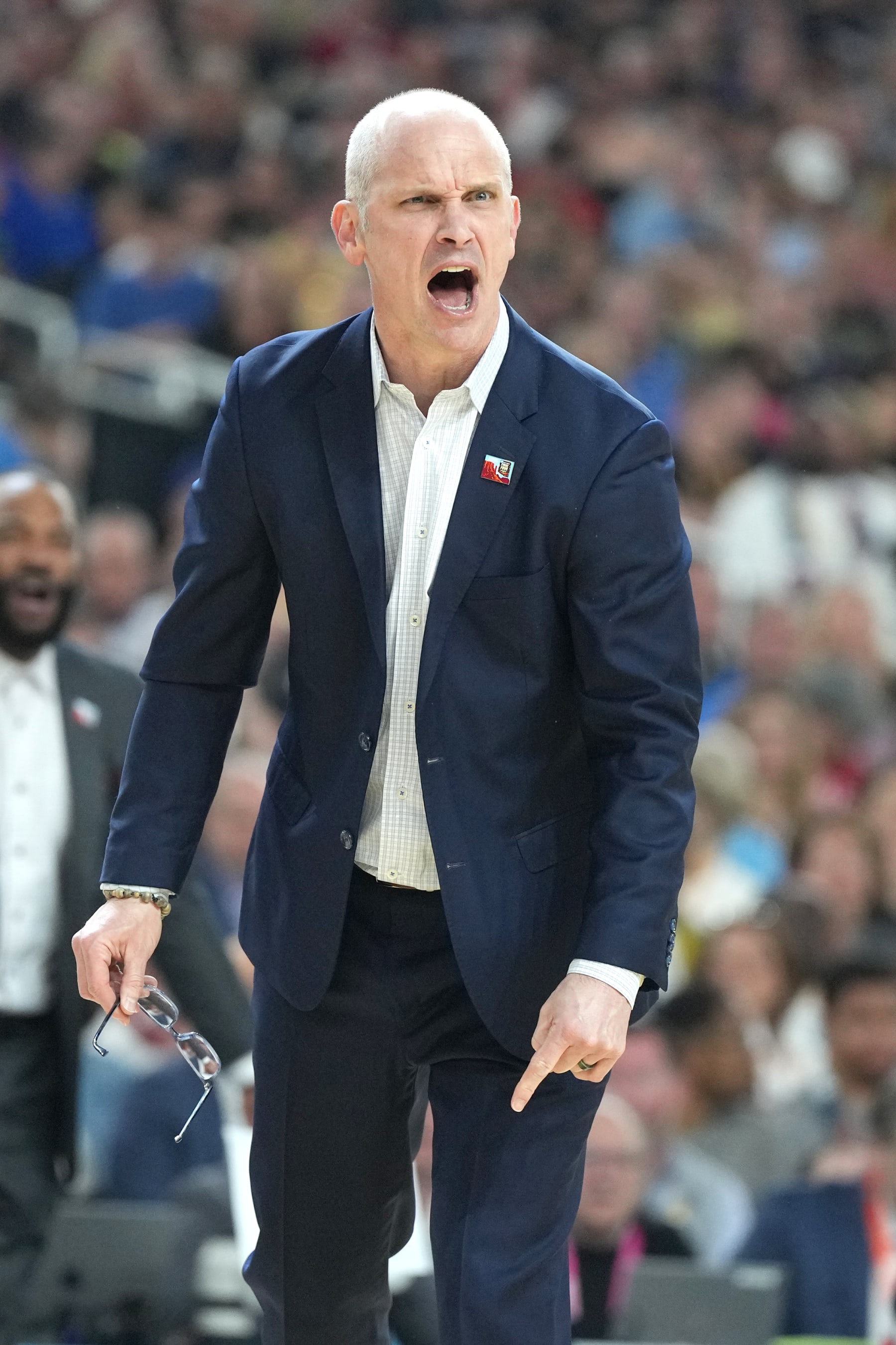 GLENDALE, ARIZONA - APRIL 06: Head coach Dan Hurley of The Connecticut Huskies reacts to a call during the NCAA Mens Basketball Tournament Final Four semifinal game against the Alabama Crimson Tide at State Farm Stadium on April 06, 2024 in Glendale, Arizona. (Photo by Mitchell Layton/Getty Images)