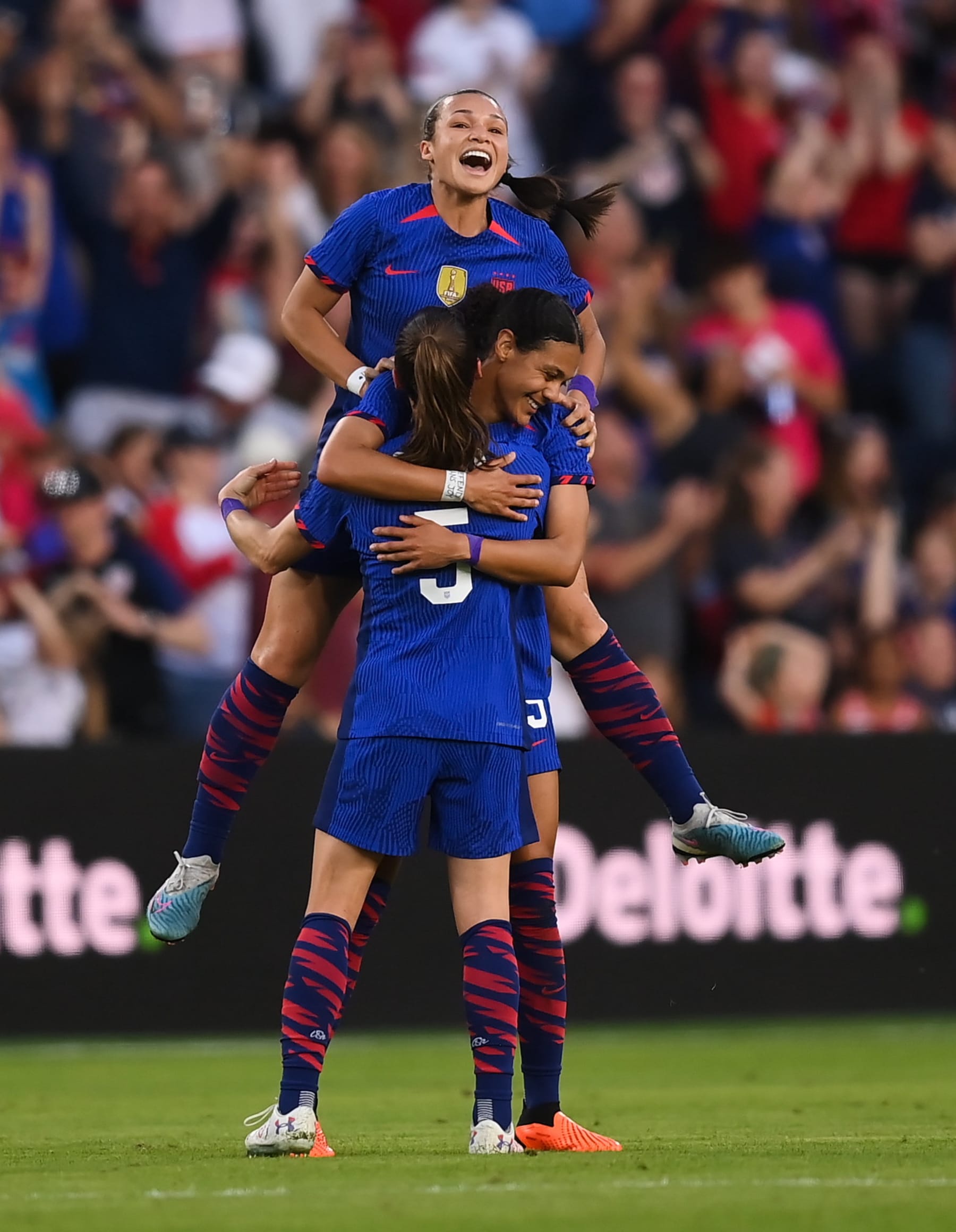 Missouri , United States - 11 April 2023; Alana Cook of United States celebrates with teammate Kelley O'Hara, 5, and Sophia Smith, top, after scoring their side's first goal during the women's international friendly match between USA and Republic of Ireland at CITYPARK in St Louis, Missouri, USA. (Photo By Stephen McCarthy/Sportsfile via Getty Images)