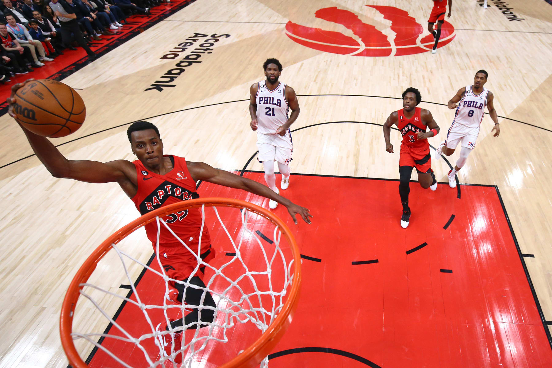 TORONTO, CANADA - OCTOBER 26: Christian Koloko #35 of the Toronto Raptors dunks the ball against the Philadelphia 76ers on October 26, 2022 at the Scotiabank Arena in Toronto, Ontario, Canada. NOTE TO USER: User expressly acknowledges and agrees that, by downloading and or using this Photograph, user is consenting to the terms and conditions of the Getty Images License Agreement. Mandatory Copyright Notice: Copyright 2022 NBAE (Photo by Vaughn Ridley/NBAE via Getty Images)