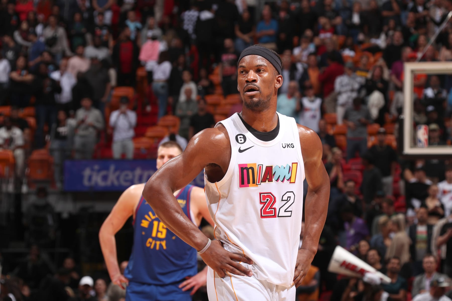 MIAMI, FL - FEBRUARY 13: Jimmy Butler #22 of the Miami Heat looks on during the game against the Denver Nuggets on February 13, 2023 at Miami-Dade Arena in Miami, Florida. NOTE TO USER: User expressly acknowledges and agrees that, by downloading and or using this Photograph, user is consenting to the terms and conditions of the Getty Images License Agreement. Mandatory Copyright Notice: Copyright 2023 NBAE (Photo by Issac Baldizon/NBAE via Getty Images)