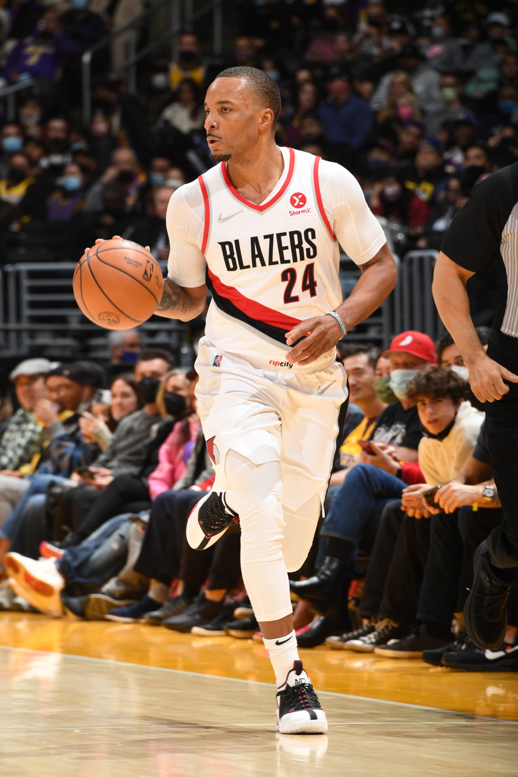 LOS ANGELES, CA - FEBRUARY 2: Norman Powell #24 of the Portland Trail Blazers dribbles the ball  during the game against the Los Angeles Lakers on February 2, 2022 at Crypto.com Arena in Los Angeles, California. NOTE TO USER: User expressly acknowledges and agrees that, by downloading and/or using this Photograph, user is consenting to the terms and conditions of the Getty Images License Agreement. Mandatory Copyright Notice: Copyright 2021 NBAE (Photo by Andrew D. Bernstein/NBAE via Getty Images)
