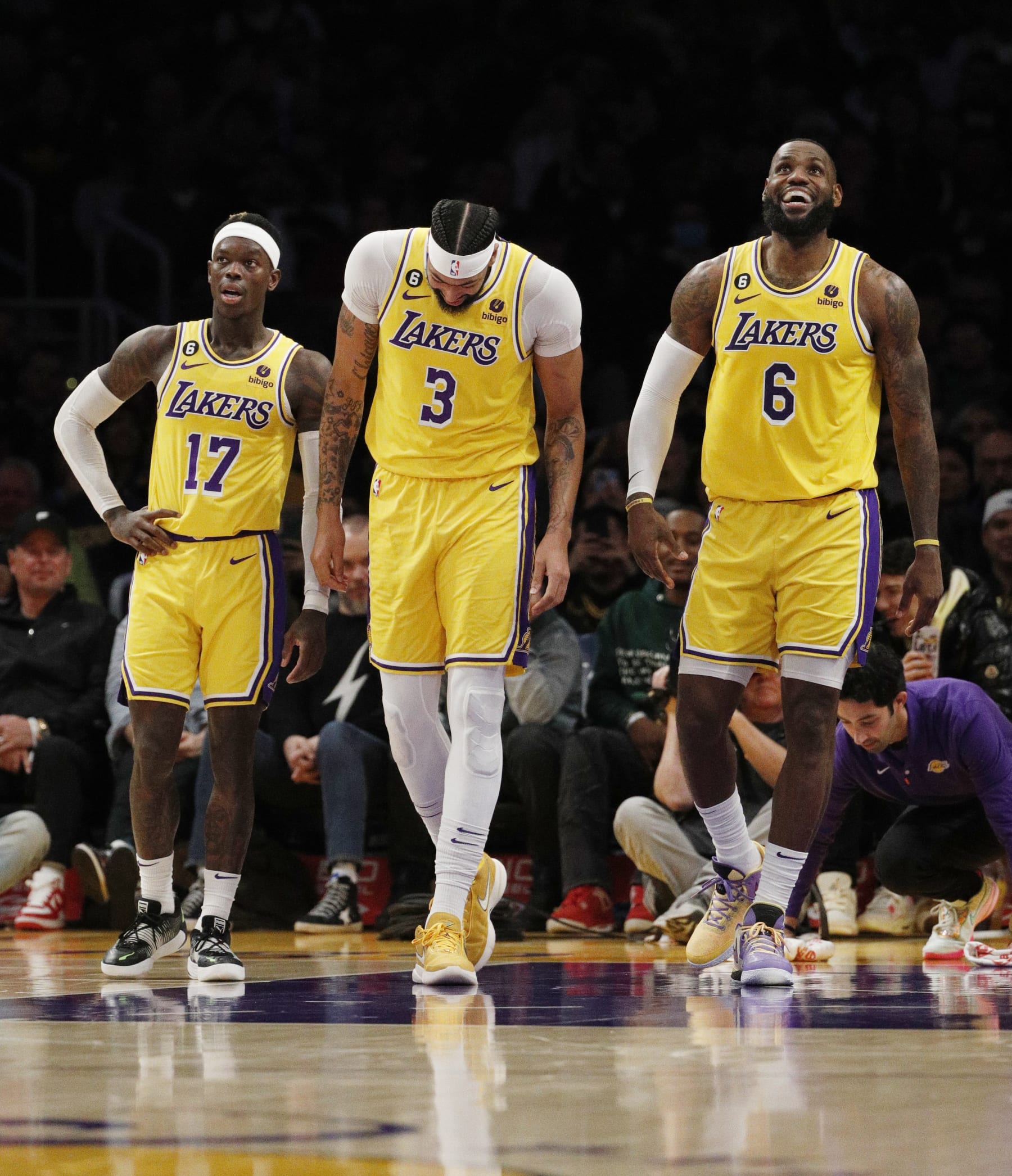 LOS ANGELES, CA - JANUARY 25, 2023: Los Angeles Lakers forward LeBron James (6), right, smiles up at the scoreboard next to Los Angeles Lakers forward Anthony Davis (3), and Los Angeles Lakers guard Dennis Schroder (17) in the closing moments of the Lakers win against the San Antonio Spurs  in the 4th quarter at Crypto.com Arena on January 25, 2023 in Los Angeles, California. (Gina Ferazzi / Los Angeles Times via Getty Images)