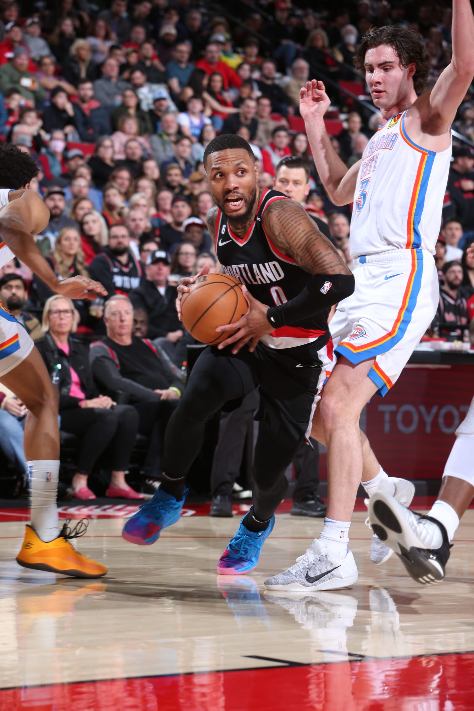 PORTLAND, OR - FEBRUARY 10: Damian Lillard #0 of the Portland Trail Blazers moves the ball during the game against the Oklahoma City Thunder on February 10, 2023 at the Moda Center Arena in Portland, Oregon. NOTE TO USER: User expressly acknowledges and agrees that, by downloading and or using this photograph, user is consenting to the terms and conditions of the Getty Images License Agreement. Mandatory Copyright Notice: Copyright 2023 NBAE (Photo by Sam Forencich/NBAE via Getty Images)