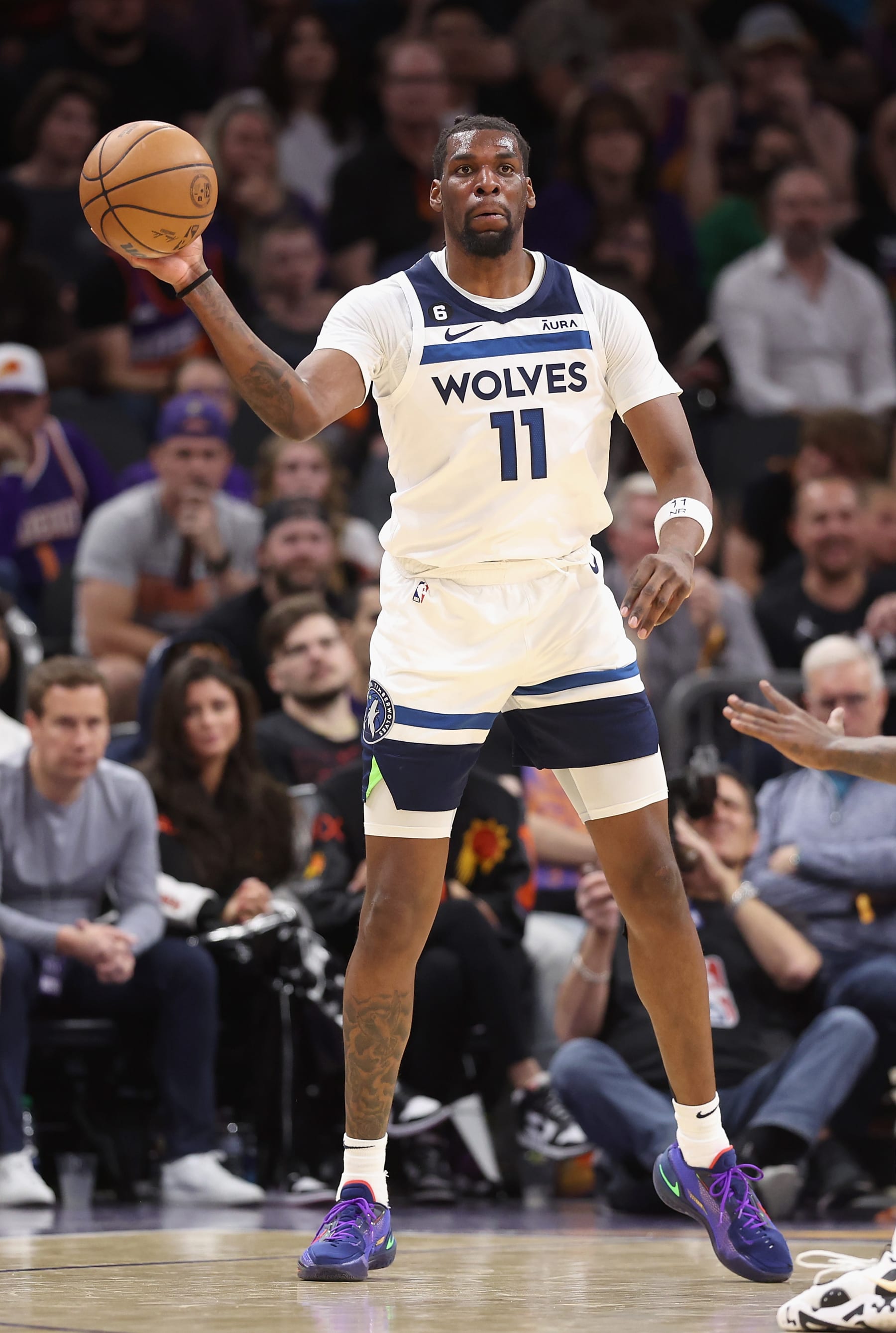 PHOENIX, ARIZONA - MARCH 29: Naz Reid #11 of the Minnesota Timberwolves handles the ball during the second half of the NBA game at Footprint Center on March 29, 2023 in Phoenix, Arizona. The Suns defeated the Timberwolves 107-100.  NOTE TO USER: User expressly acknowledges and agrees that, by downloading and or using this photograph, User is consenting to the terms and conditions of the Getty Images License Agreement.  (Photo by Christian Petersen/Getty Images)