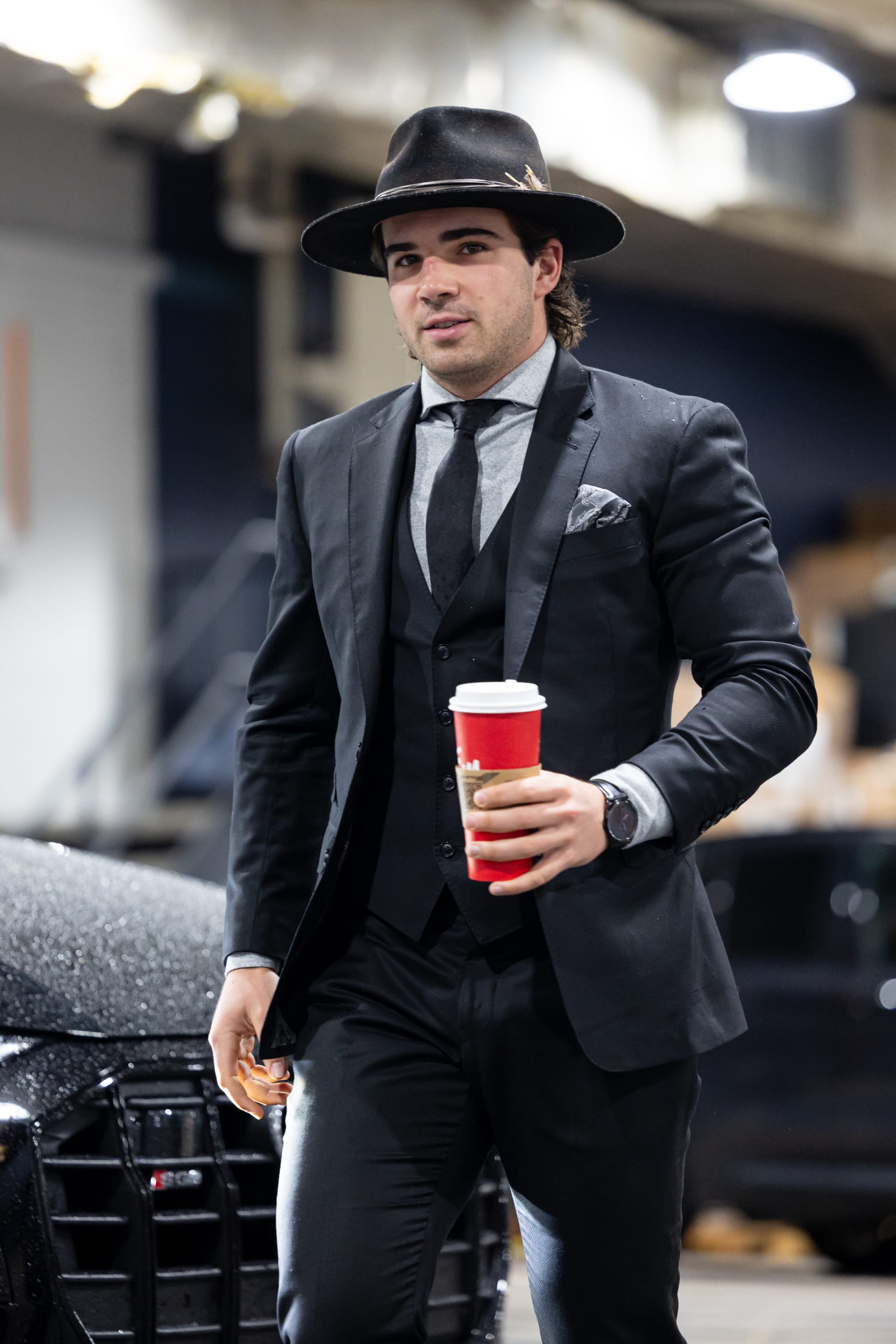 MONTREAL, CANADA - OCTOBER 21: Alex Newhook #15 of the Montreal Canadiens arrives before the NHL regular season game against the Washington Capitals at the Bell Centre on October 21, 2023 in Montreal, Quebec, Canada. (Photo by Vitor Munhoz/NHLI via Getty Images)