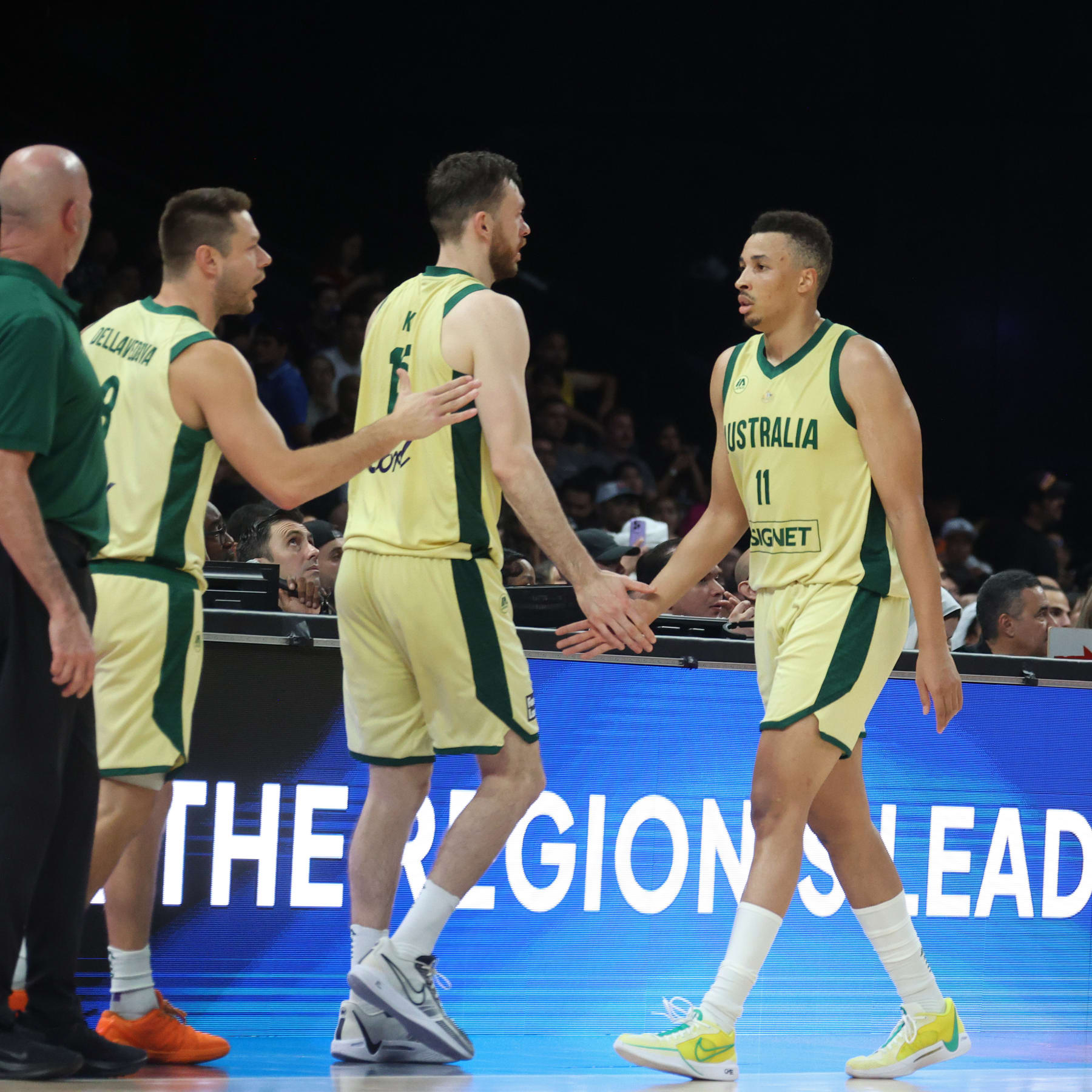 ABU DHABI, UAE - JULY 15: Dante Exum #11 of the Australian Basketball Men's Team high fives during the game against the USA Basketball Men's Team during the 2024 USA Basketball Showcase on July 15, 2024 in Abu Dhabi, The United Arab Emirates at Etihad Arena. NOTE TO USER: User expressly acknowledges and agrees that, by downloading and/or using this Photograph, user is consenting to the terms and conditions of the Getty Images License Agreement. Mandatory Copyright Notice: Copyright 2024 NBAE (Photo by Nathaniel S. Butler/NBAE via Getty Images)