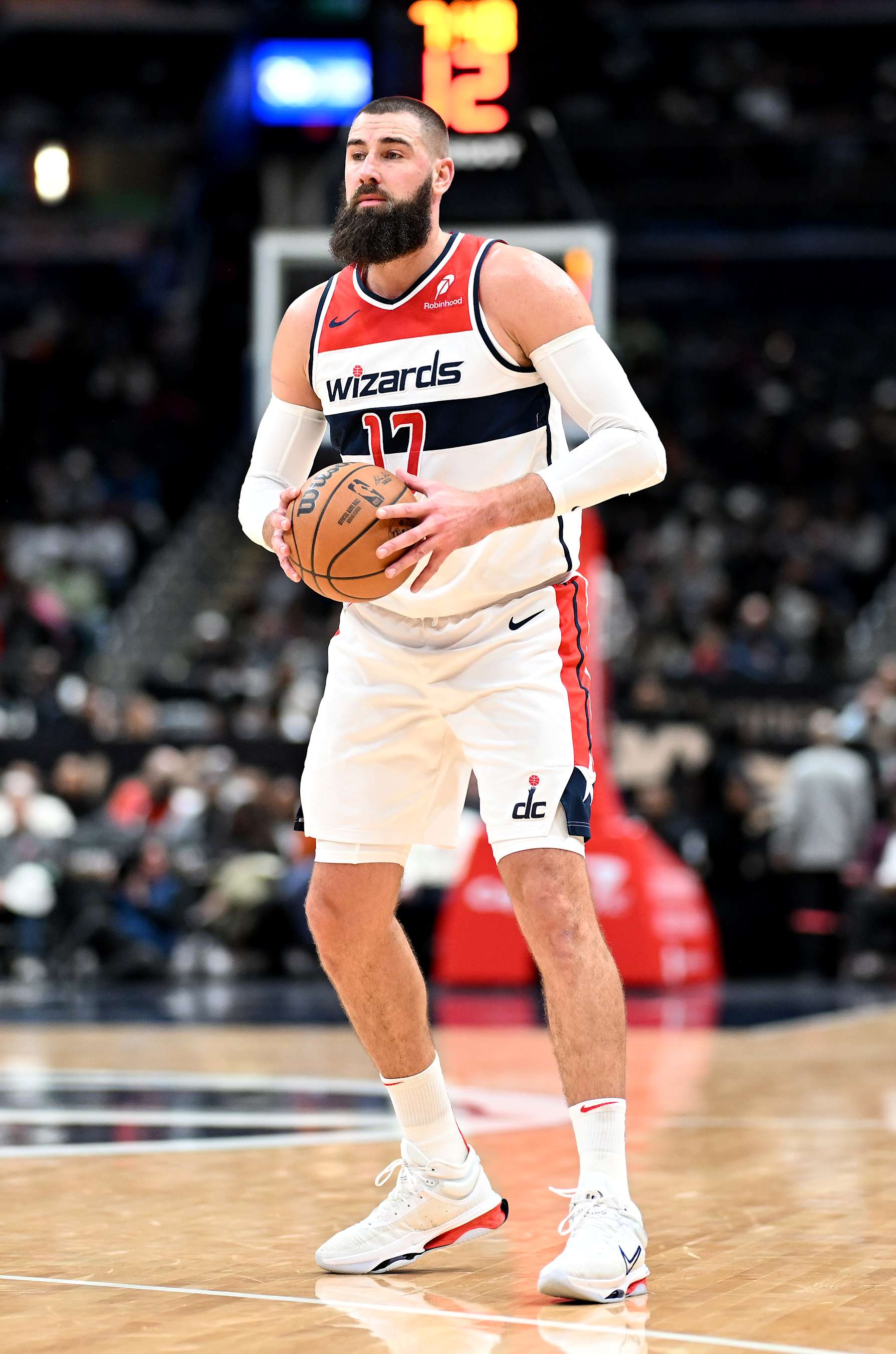 WASHINGTON, DC - DECEMBER 19: Jonas Valanciunas #17 of the Washington Wizards handles the ball against the Charlotte Hornets at Capital One Arena on December 19, 2024 in Washington, DC. NOTE TO USER: User expressly acknowledges and agrees that, by downloading and or using this photograph, User is consenting to the terms and conditions of the Getty Images License Agreement.  (Photo by G Fiume/Getty Images)