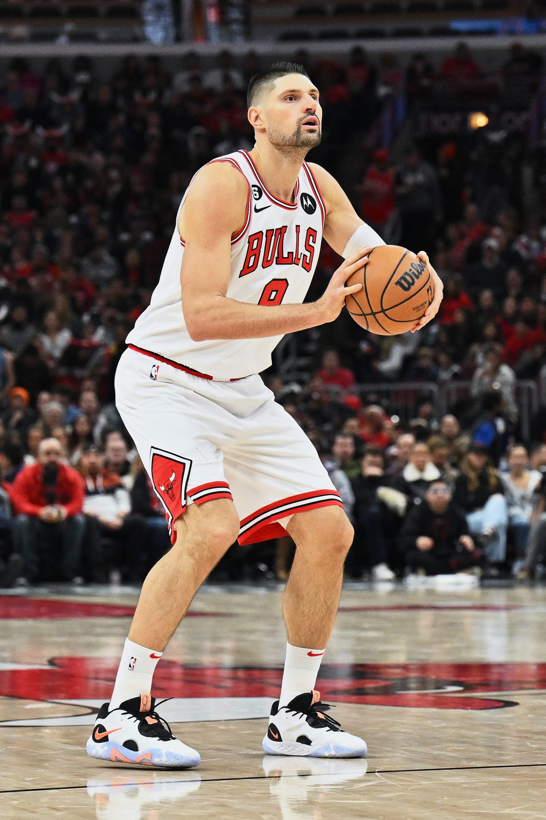 CHICAGO, ILLINOIS - DECEMBER 26:  Nikola Vucevic #9 of the Chicago Bulls controls the ball against the Houston Rockets on December 26, 2022 at United Center in Chicago, Illinois. Houston defeated Chicago 133-118.   NOTE TO USER: User expressly acknowledges and agrees that, by downloading and or using this photograph, User is consenting to the terms and conditions of the Getty Images License Agreement.  (Photo by Jamie Sabau/Getty Images)