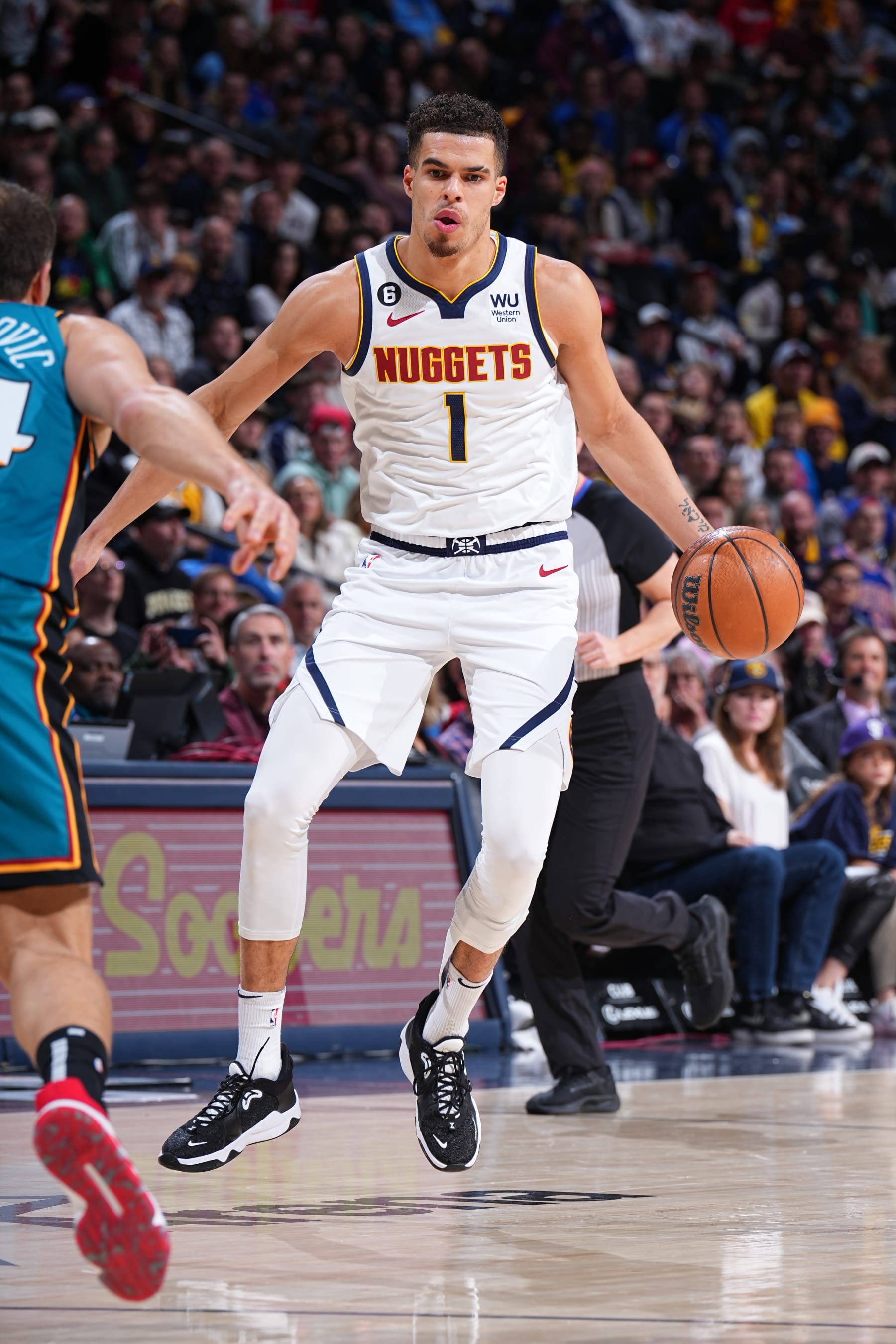 DENVER, CO - NOVEMBER 22: Michael Porter Jr. #1 of the Denver Nuggets dribbles the ball during the game against the Detroit Pistons on November 22, 2022 at the Ball Arena in Denver, Colorado. NOTE TO USER: User expressly acknowledges and agrees that, by downloading and/or using this Photograph, user is consenting to the terms and conditions of the Getty Images License Agreement. Mandatory Copyright Notice: Copyright 2022 NBAE (Photo by Garrett Ellwood/NBAE via Getty Images)