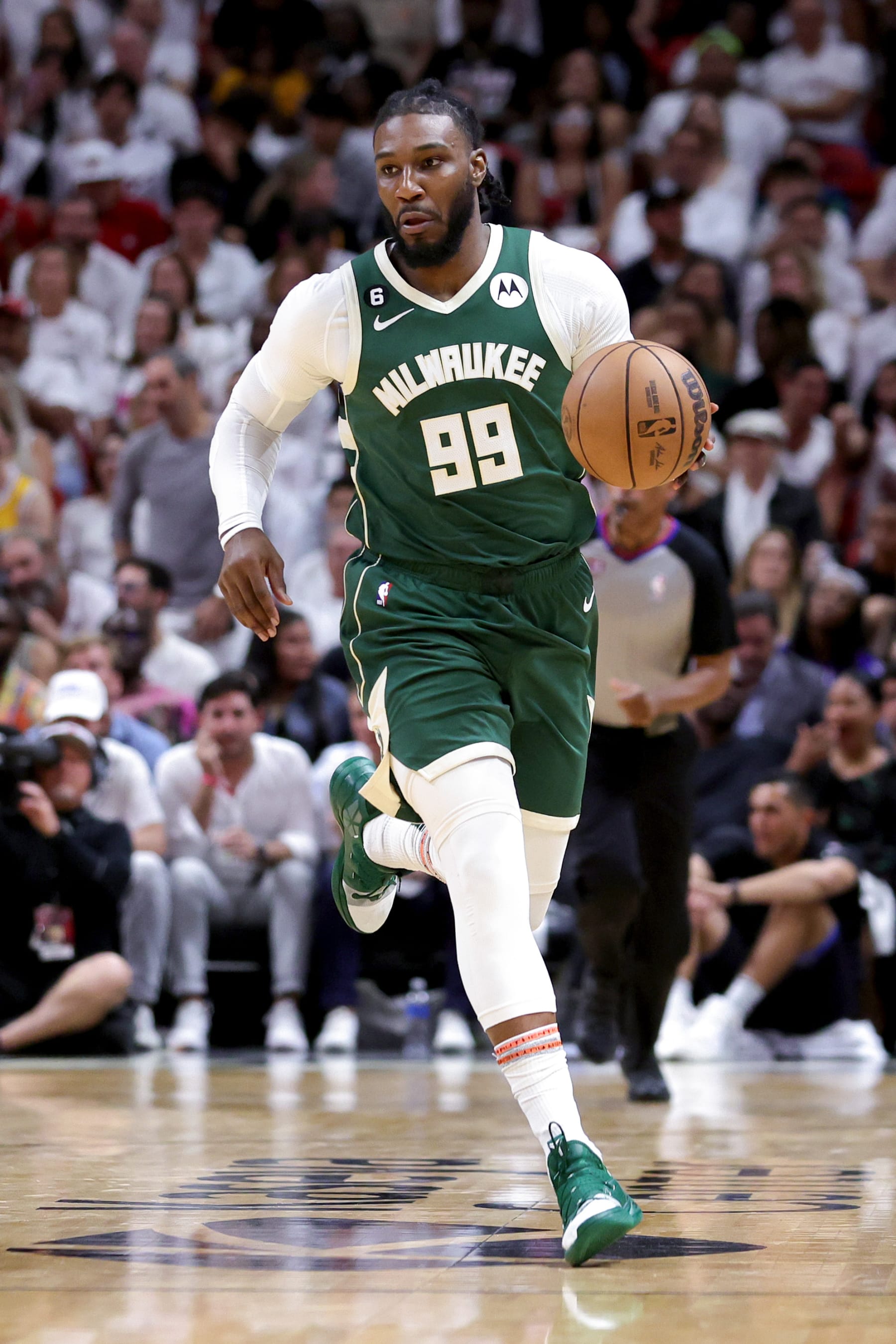 MIAMI, FLORIDA - APRIL 22: Jae Crowder #99 of the Milwaukee Bucks dribbles the ball against the Miami Heat during the fourth quarter in Game Three of the Eastern Conference First Round Playoffs at Kaseya Center on April 22, 2023 in Miami, Florida. NOTE TO USER: User expressly acknowledges and agrees that, by downloading and or using this photograph, User is consenting to the terms and conditions of the Getty Images License Agreement. (Photo by Megan Briggs/Getty Images)