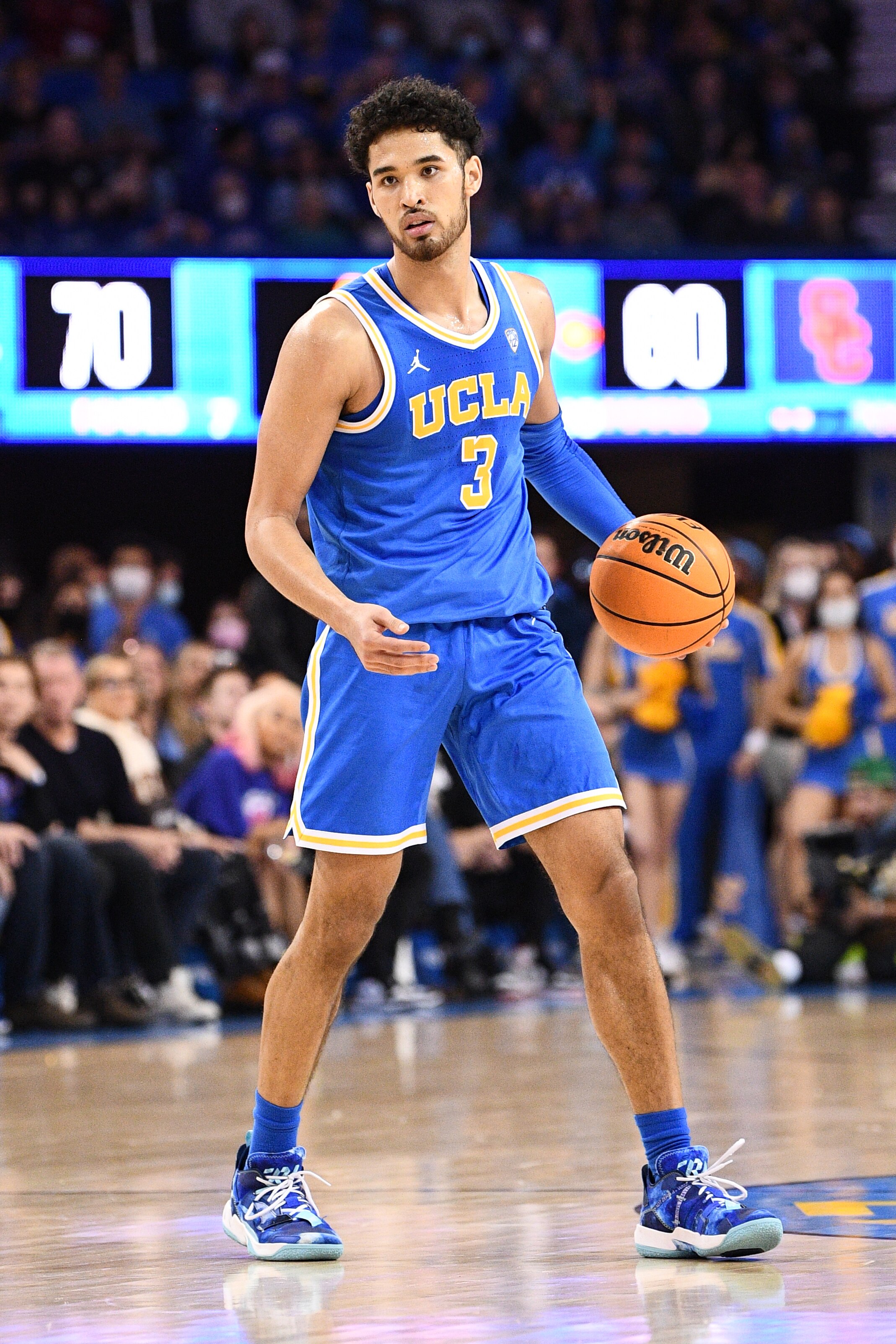 LOS ANGELES, CA - MARCH 05: UCLA Bruins guard Johnny Juzang (3) dribbles up the court during a college basketball game between the USC Trojans and the UCLA Bruins on March 5, 2022, at Pauley Pavilion in Los Angeles, CA. (Photo by Brian Rothmuller/Icon Sportswire via Getty Images)