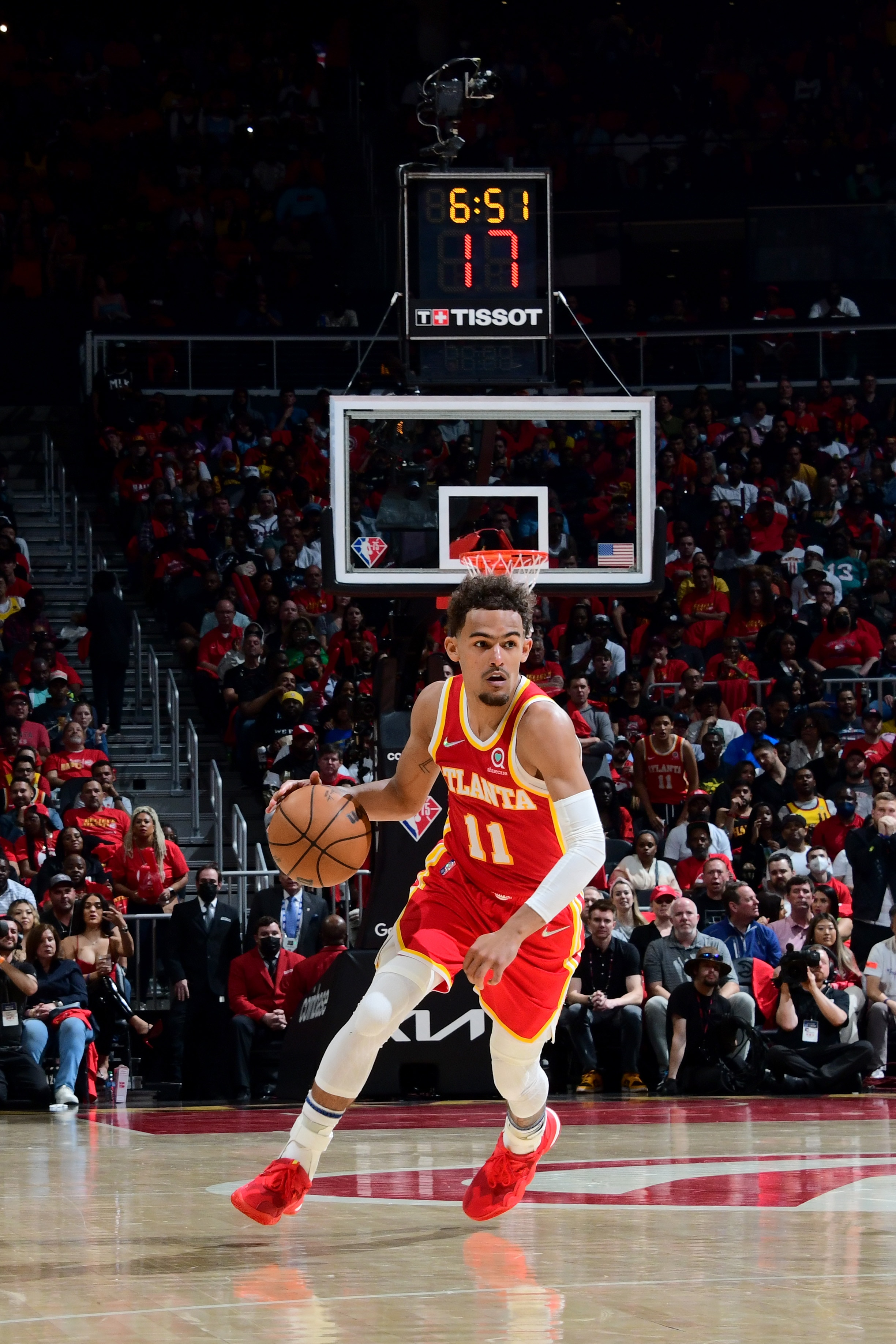 ATLANTA, GA - APRIL 22: Trae Young #11 of the Atlanta Hawks dribbles the ball during the game against the Miami Heat during Round 1 Game 3 of the NBA Playoffs on April 22, 2022 at State Farm Arena in Atlanta, Georgia.  NOTE TO USER: User expressly acknowledges and agrees that, by downloading and/or using this Photograph, user is consenting to the terms and conditions of the Getty Images License Agreement. Mandatory Copyright Notice: Copyright 2022 NBAE (Photo by Scott Cunningham/NBAE via Getty Images)