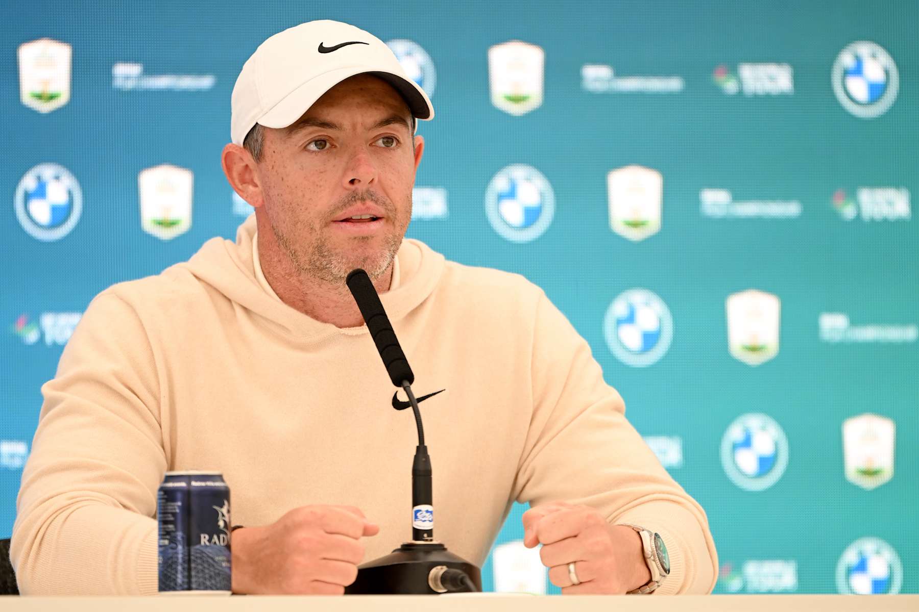 VIRGINIA WATER, ENGLAND - SEPTEMBER 18: Rory McIlroy of Northern Ireland talks to the media during a press conference prior to the BMW PGA Championship 2024 at Wentworth Club on September 18, 2024 in Virginia Water, England. (Photo by Ross Kinnaird/Getty Images)