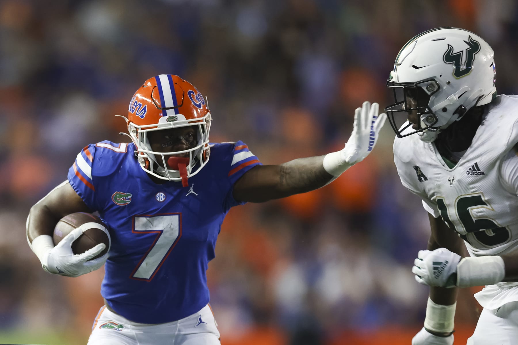 GAINESVILLE, FLORIDA - SEPTEMBER 17: Trevor Etienne #7 of the Florida Gators runs the ball during the 4th quarter of a game against the South Florida Bulls at Ben Hill Griffin Stadium on September 17, 2022 in Gainesville, Florida. (Photo by James Gilbert/Getty Images)