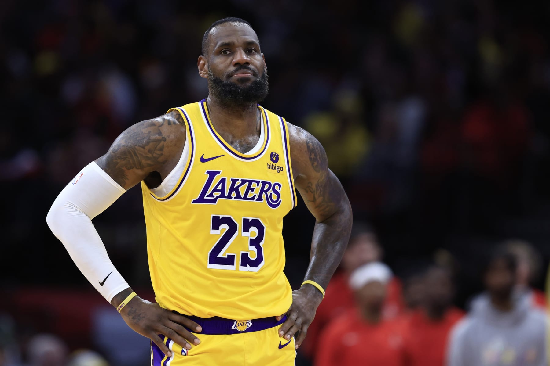 HOUSTON, TEXAS - JANUARY 29: LeBron James #23 of the Los Angeles Lakers looks on against the Houston Rockets during the first half at Toyota Center on January 29, 2024 in Houston, Texas. NOTE TO USER: User expressly acknowledges and agrees that, by downloading and or using this photograph, User is consenting to the terms and conditions of the Getty Images License Agreement.  (Photo by Carmen Mandato/Getty Images)