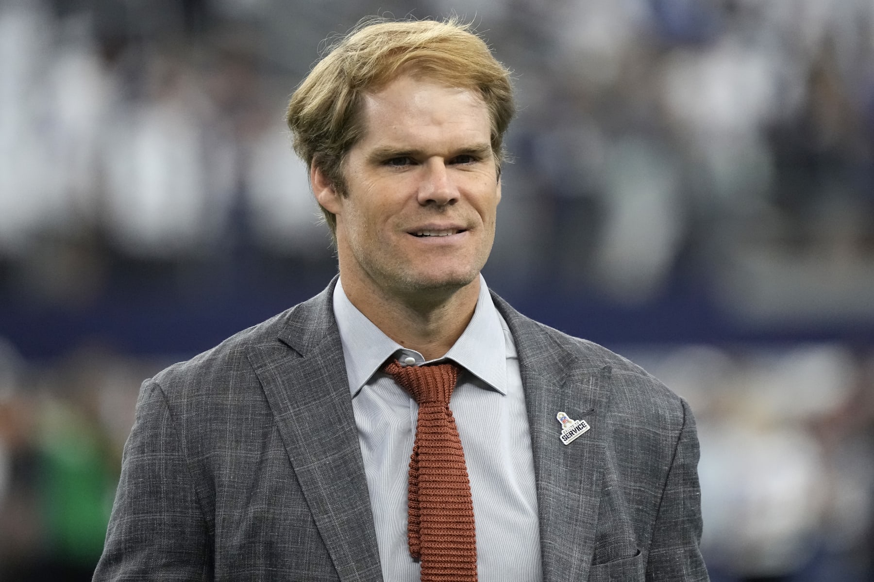 ARLINGTON, TEXAS - NOVEMBER 12: Broadcaster Greg Olsen walks the field before the game between the New York Giants and the Dallas Cowboys at AT&T Stadium on November 12, 2023 in Arlington, Texas. (Photo by Sam Hodde/Getty Images)